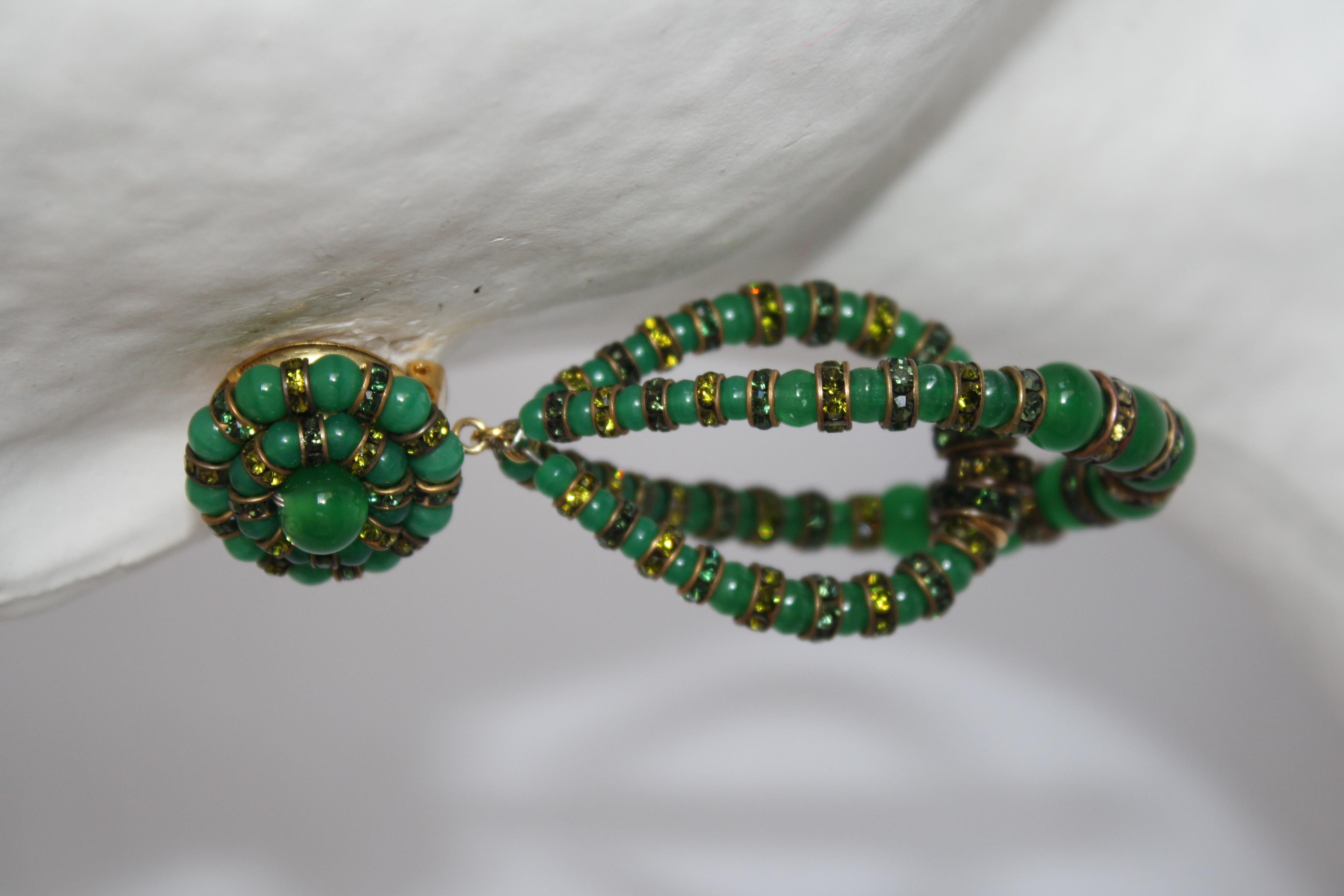 Iconic earring style from famed jewelry design house Francoise Montague. Made with green vintage beads and Swarovski Crystal roundelles.
