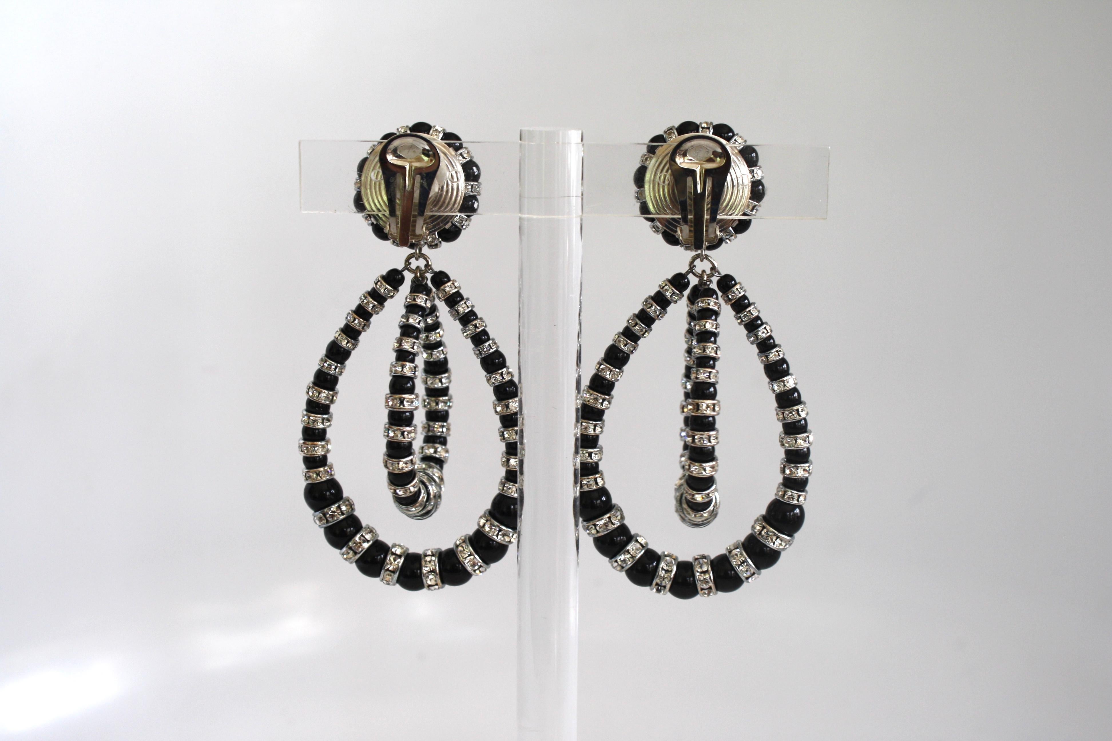 Iconic earring style from famed jewelry design house Francoise Montague. Made with glass pearl vintage beads and Swarovski Crystal rondelles on gold.
