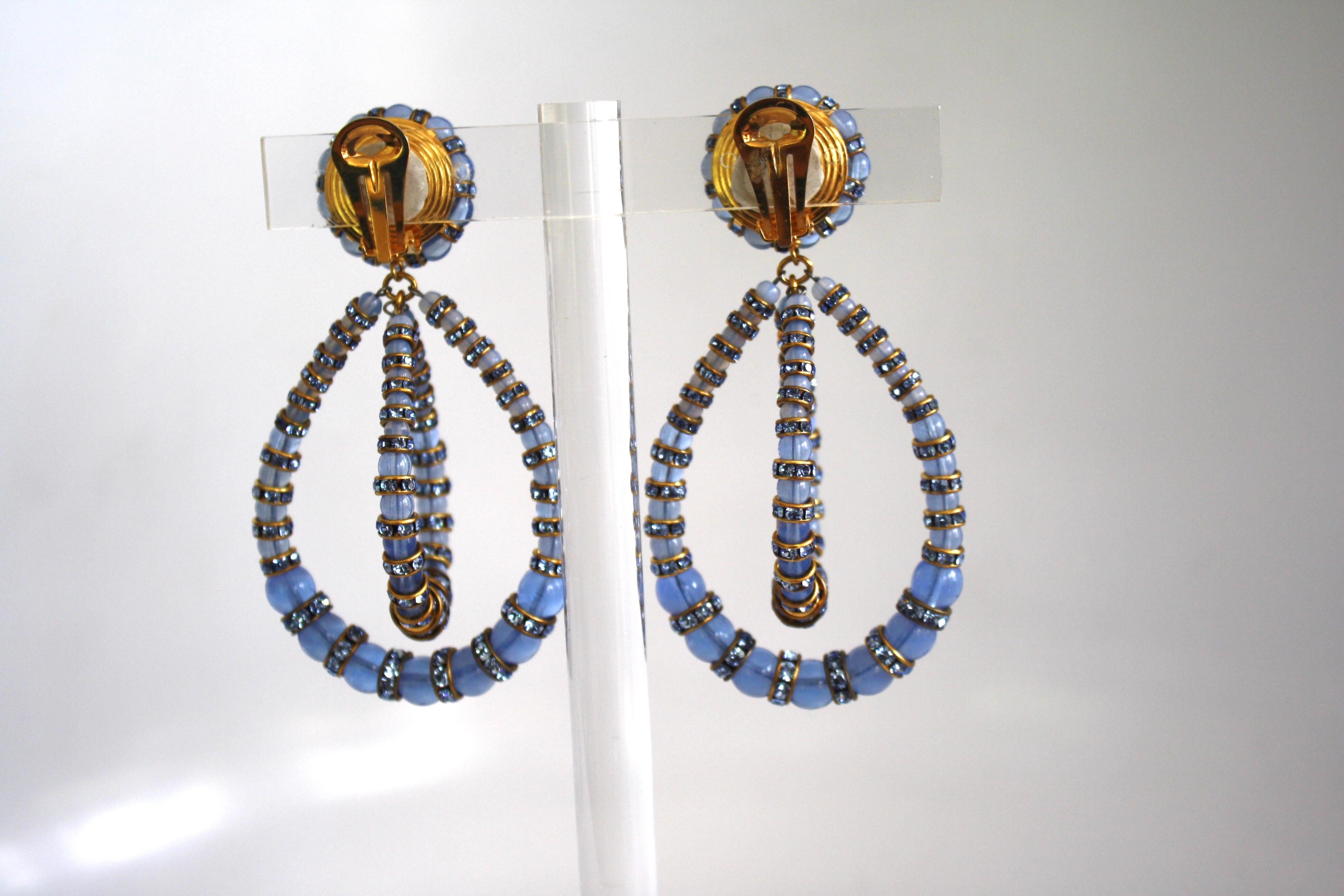 Iconic earring style from famed jewelry design house Francoise Montague. Made with glass vintage beads and Swarovski Crystal rondelles.
