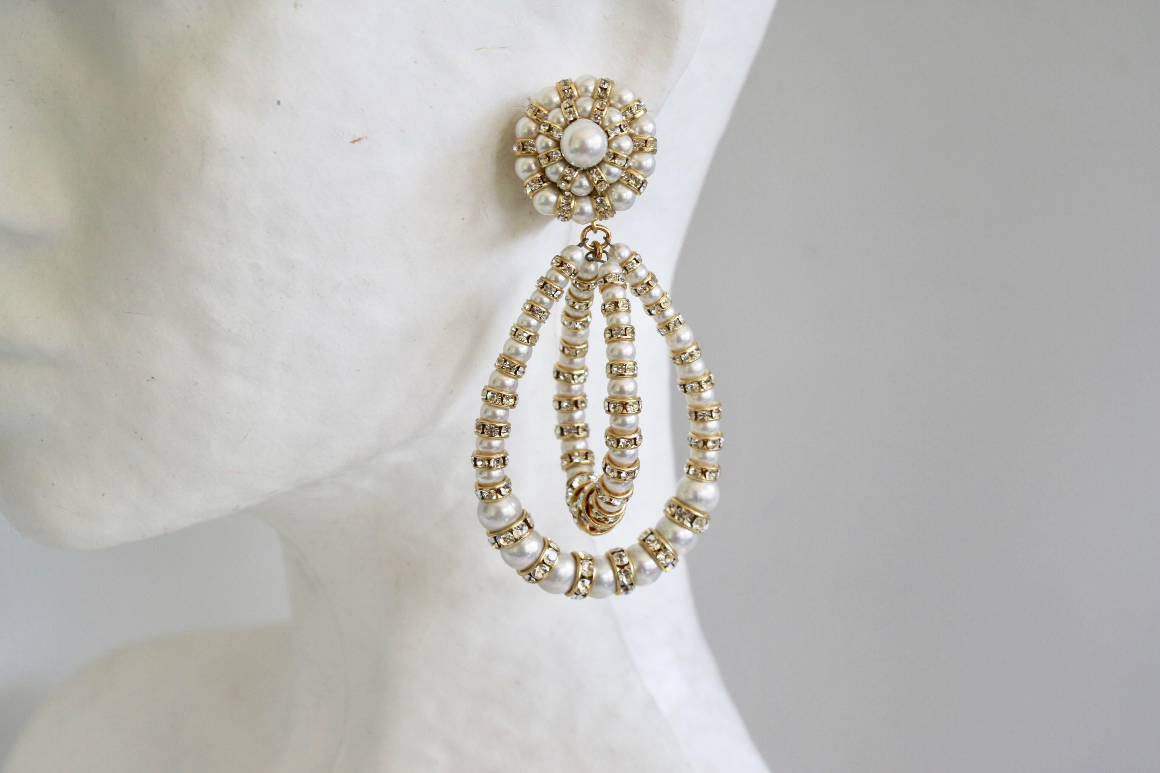 Iconic earring style from famed jewelry design house Francoise Montague. Made with glass pearl vintage beads and Swarovski Crystal rondelles on gold.