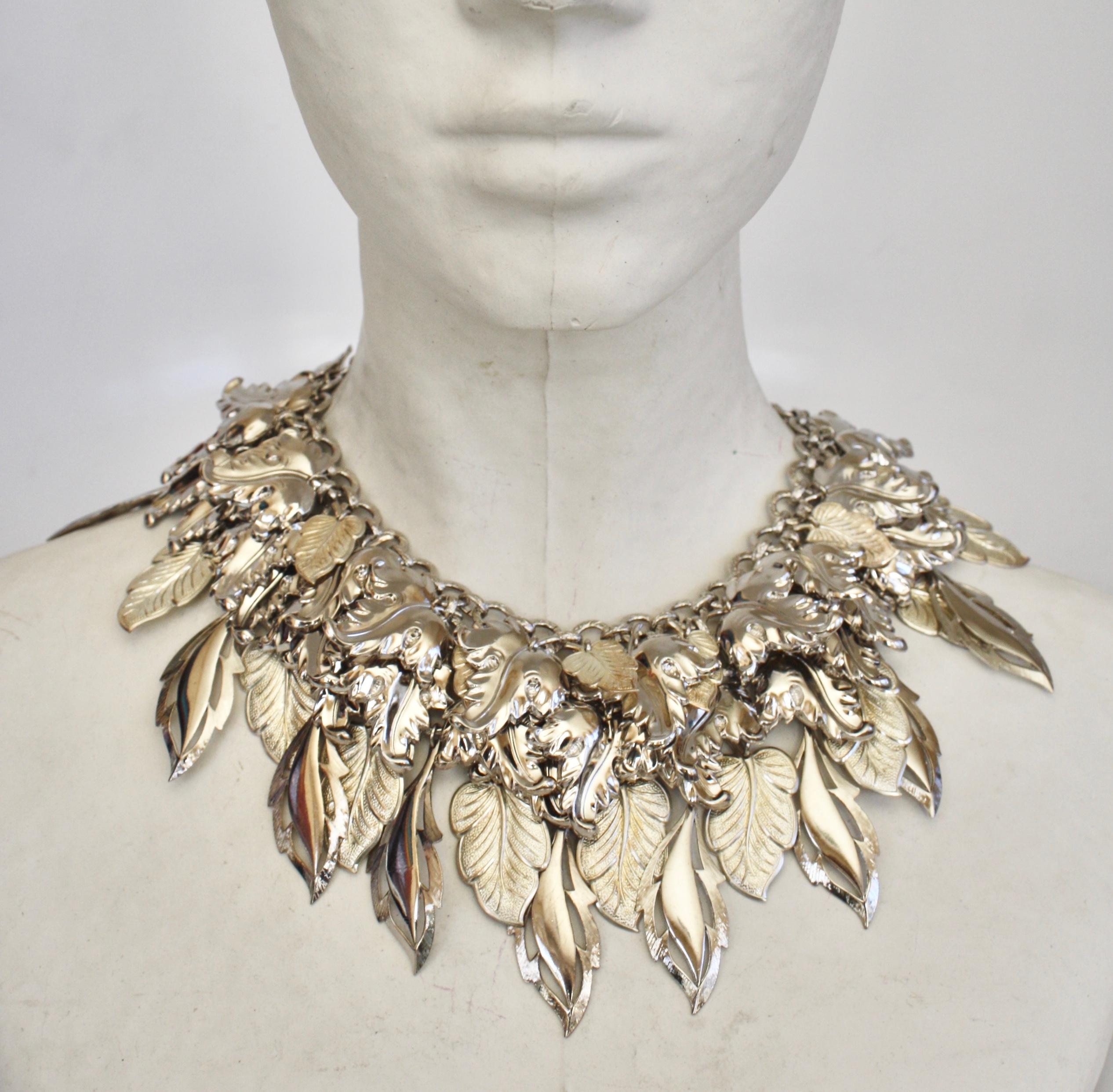Rhodium charm statement necklace from French design house Francoise Montague. 
