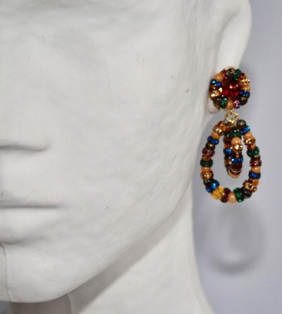 The iconic Lolita clip earrings from Françoise Montague in gold with handmade glass beads and Swarovski crystal rondelles.