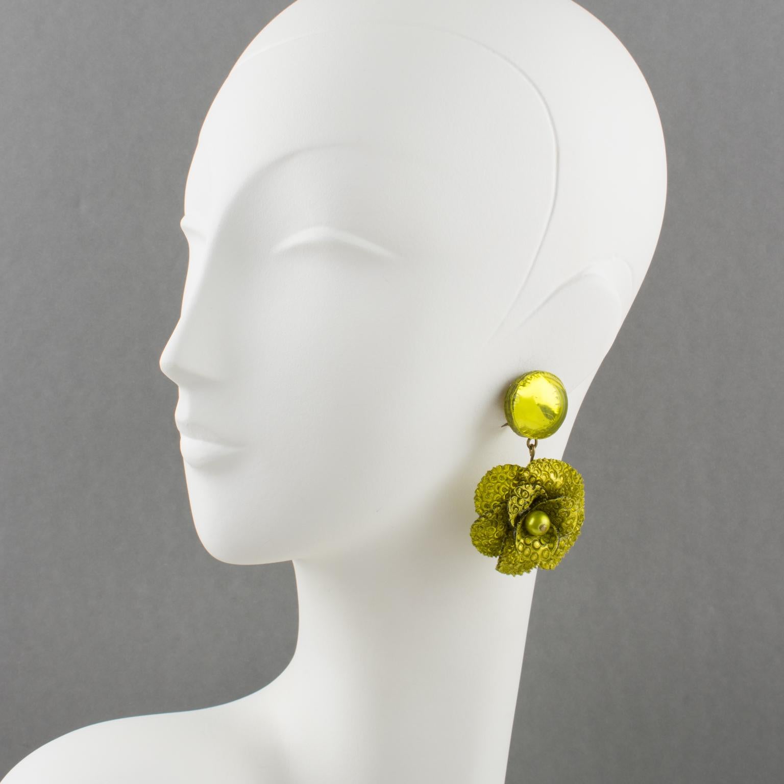 Cilea Paris designed these charming dimensional dangling resin clip-on earrings for French Jewelry designer Francoise Montague. The floral-inspired hand-made artisanal shape features vivid green-olive poppy flowers with textured patterns built