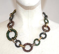 Francoise Montague Swarovski Crystal , Gold and Rhodium Embossed Metal Necklace