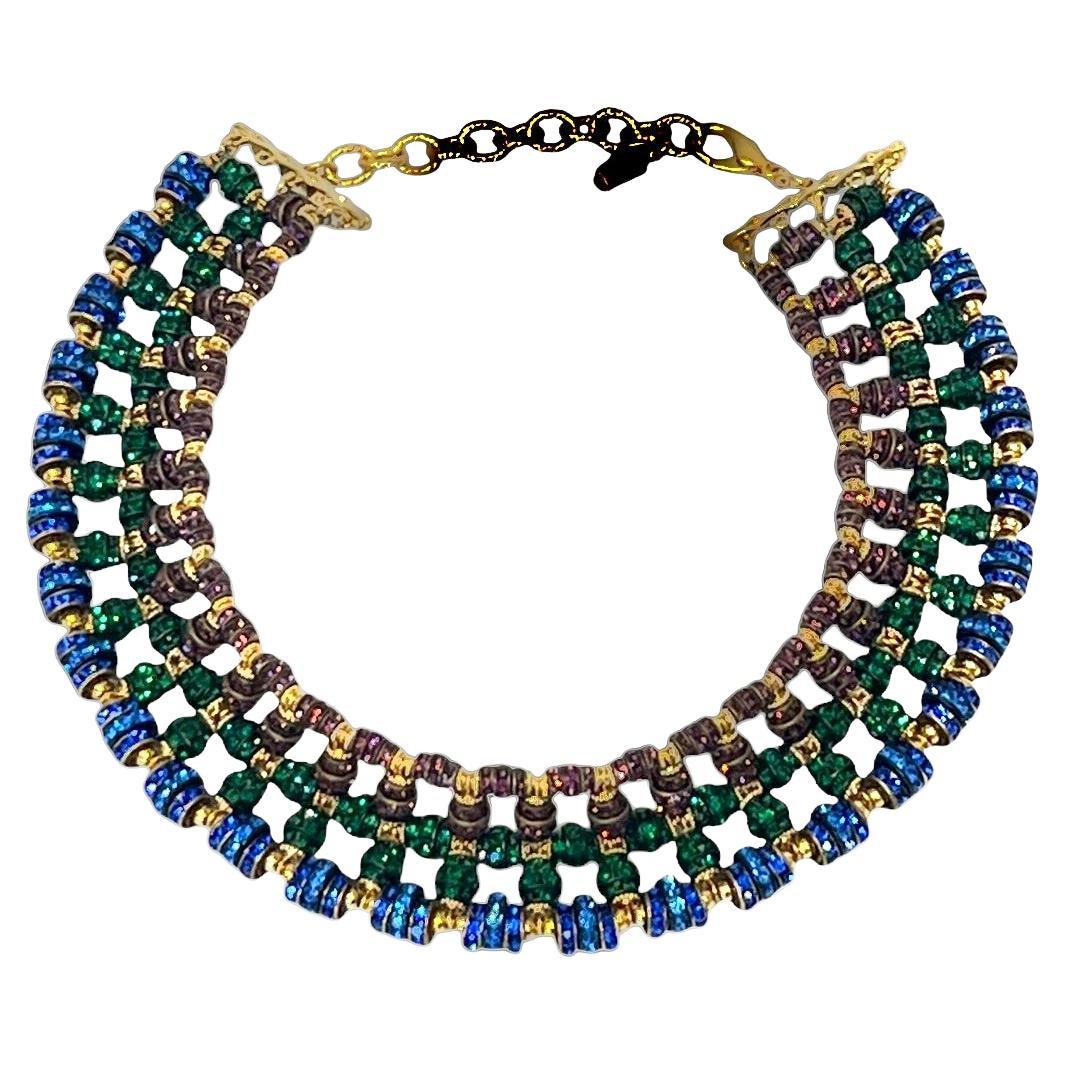 Triple tone Swarovski Crystal rondelle choker necklace from French designer Francoise Montague. 

Francoise Montague took over the De Saurma jewelry workshop in the late 1940s. Her mother founded the workshop in 1945, according to 
