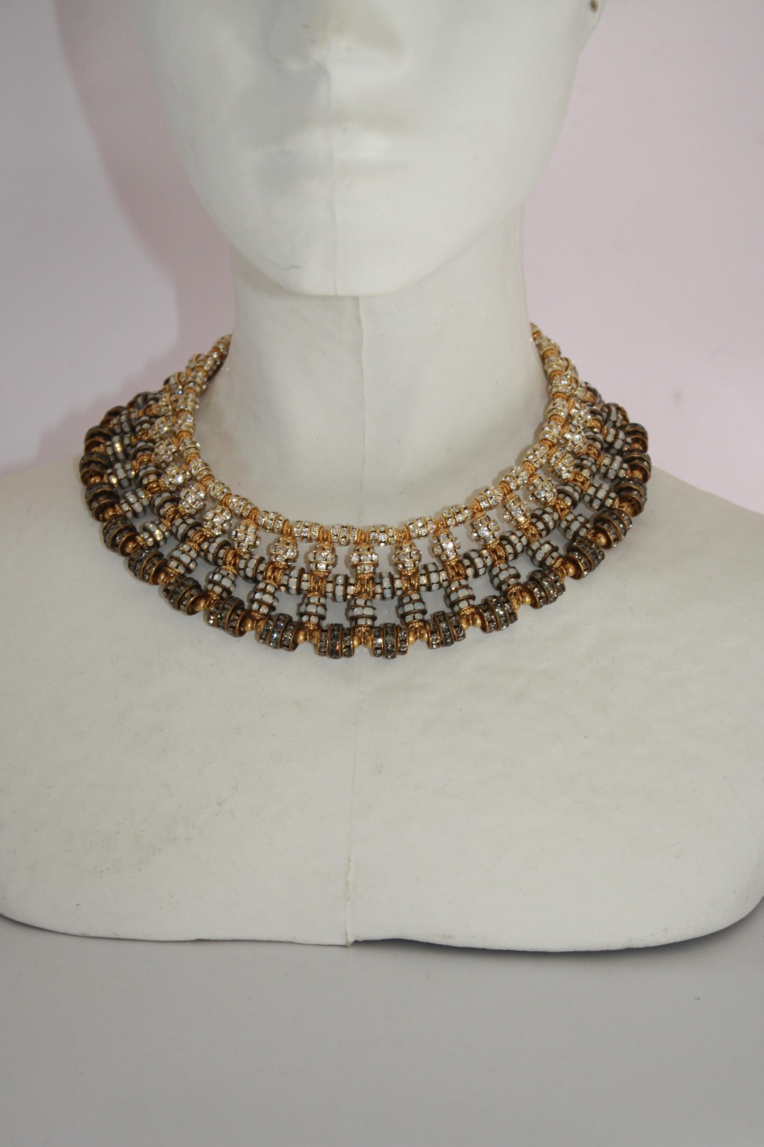 Triple tone Swarovski Crystal rondelle choker necklace from French designer Francoise Montague. 

15” plus 3” extension
1 1/2” wide 