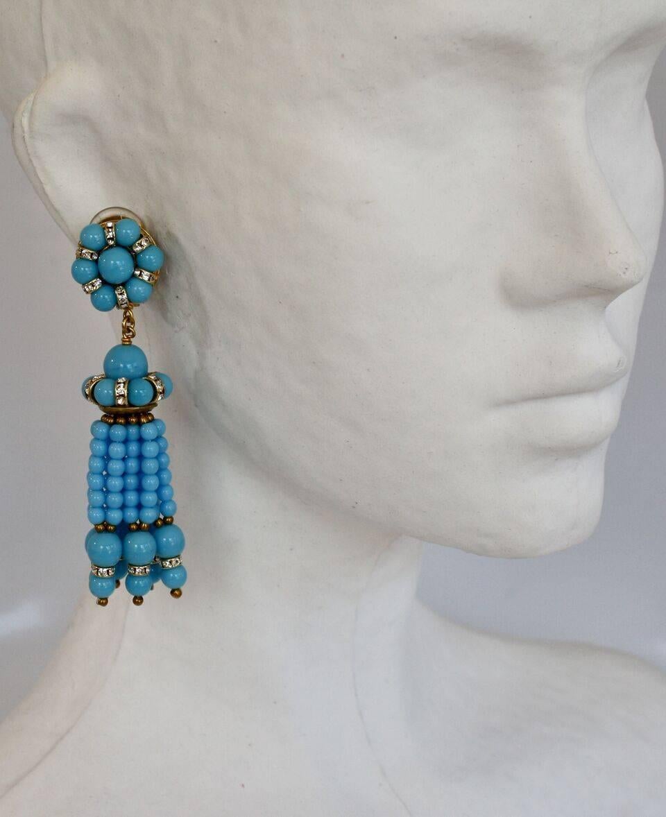 Turquoise glass bead and Swarovski Crystal rondelle tassel clip earrings from Francoise Montague. 
