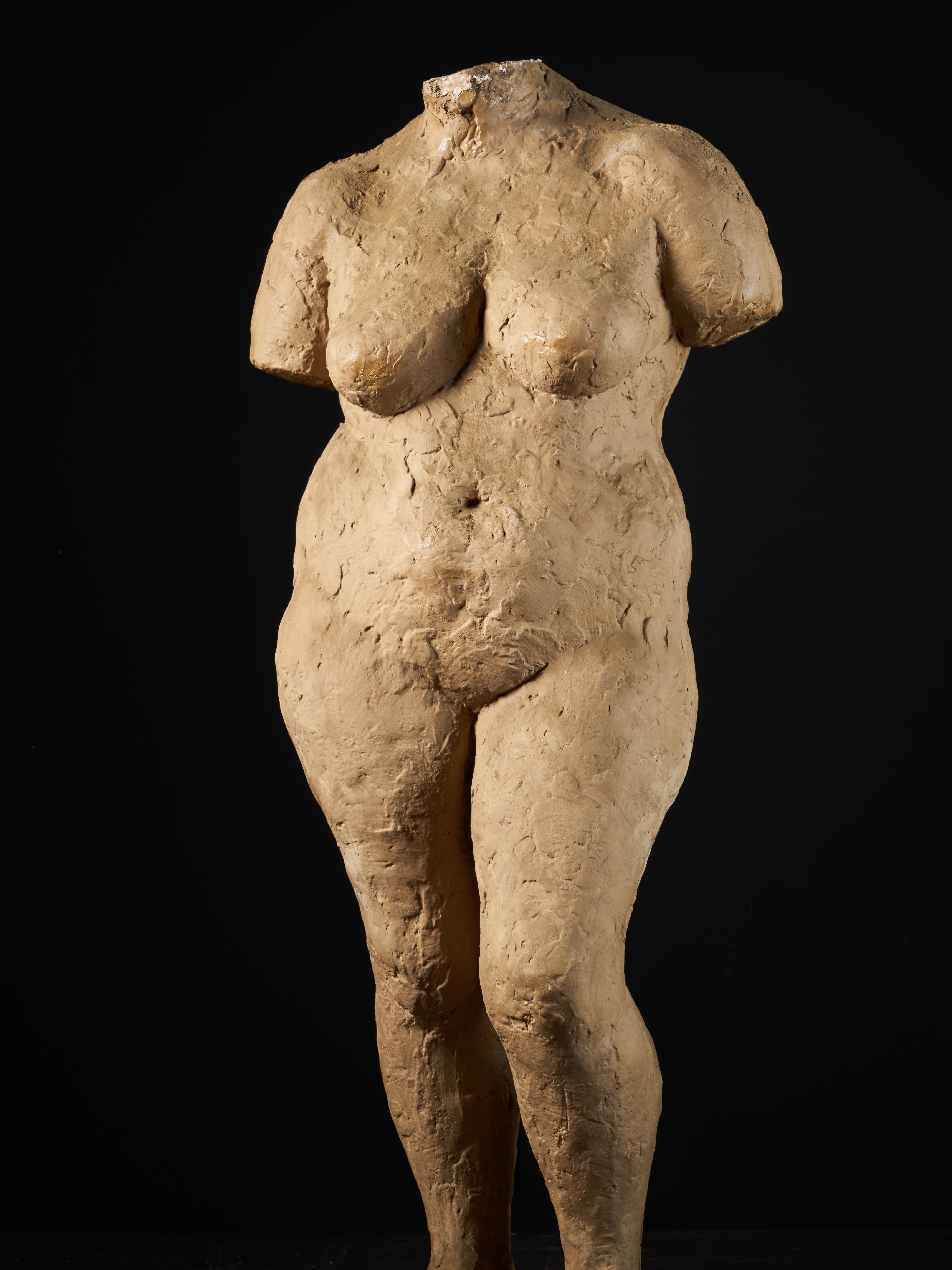A 20th century plaster statue of a female model made by the Belgium sculptor Françoise Rival (1927-1990).