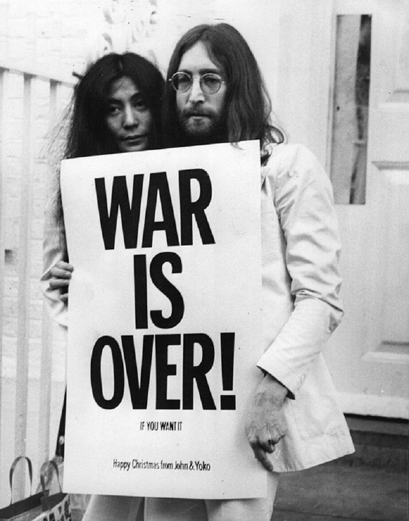 "War Is Over" by Frank Barrett

John Lennon (1940 - 1980) and Yoko Ono pose on the steps of the Apple building in London, holding one of the posters that they distributed to the world's major cities as part of a peace campaign protesting against the