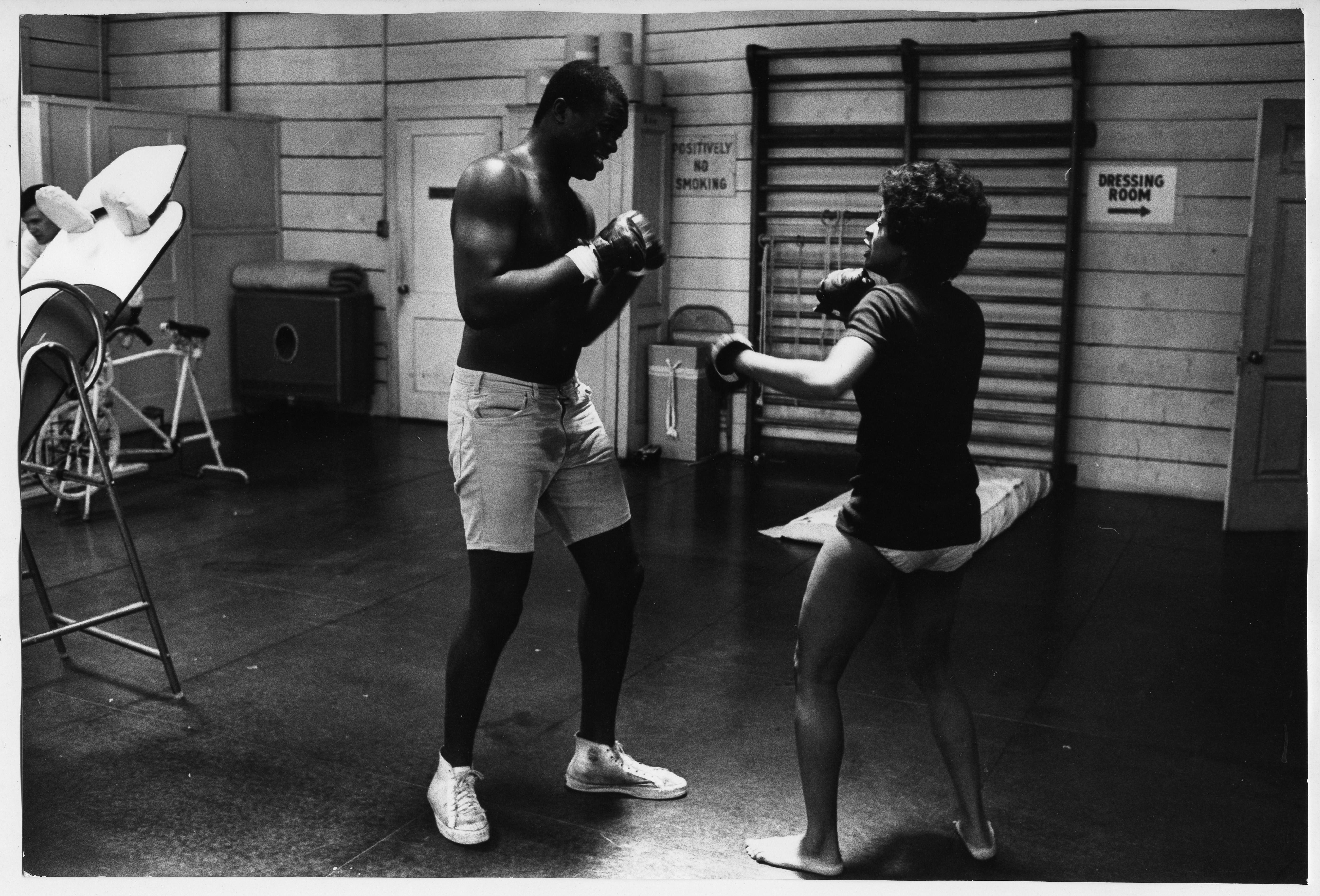 Lola Falana boxing in the gym photographed by Frank Dandridge, 1969.