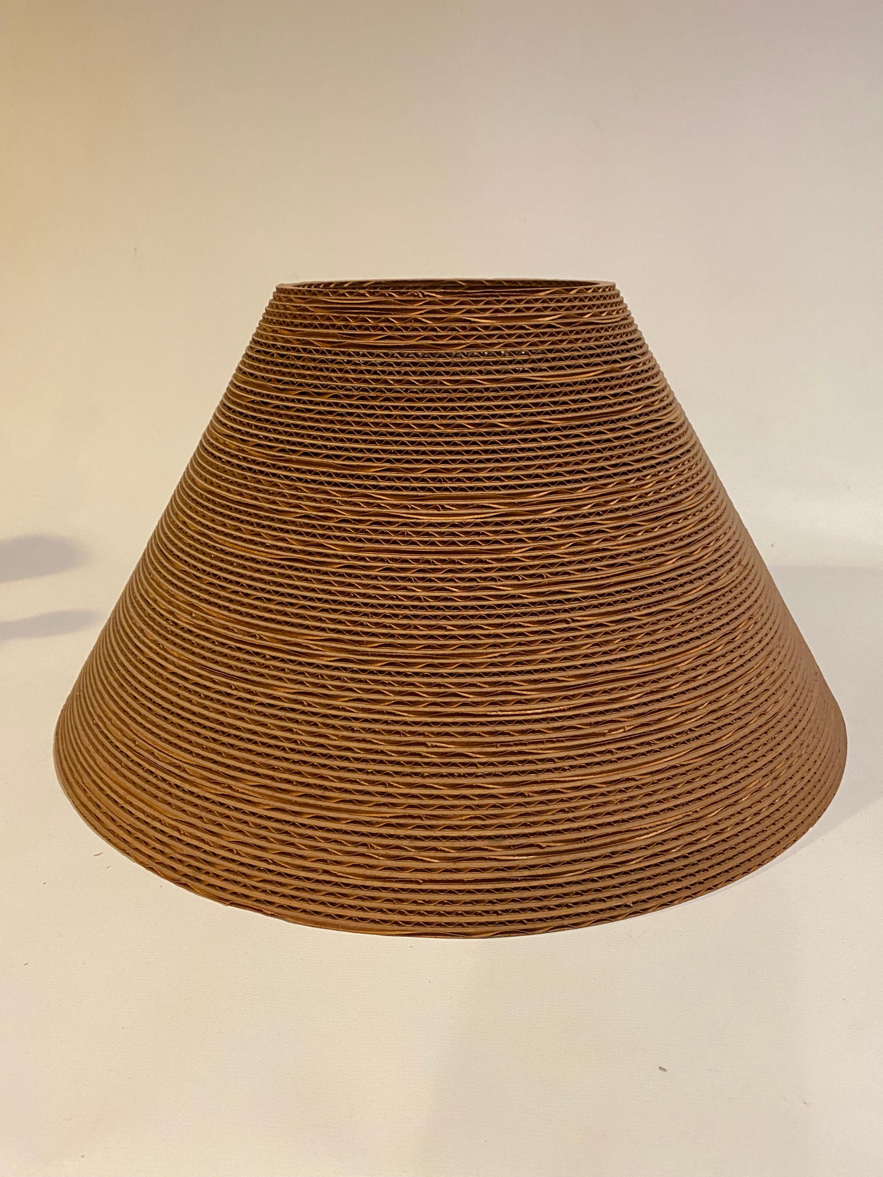Easy Edges corrugated and layered cardboard lamp shade. A wonderfully imaginative design by the master architect and designer, Frank Gehry. Circa 1970. Great for a Gehry table lamp missing its shade or wired as a hanging pendant light. Good overall