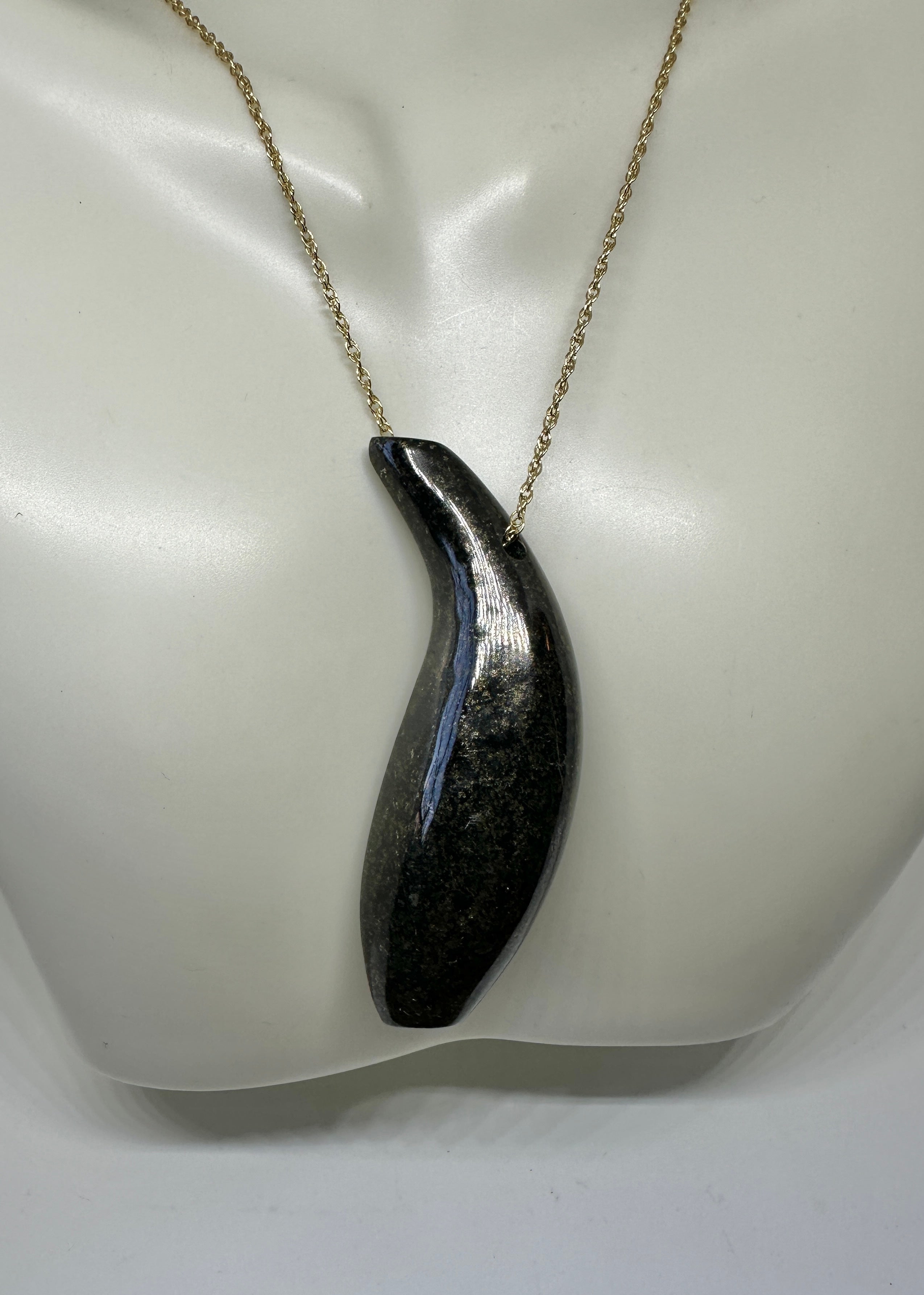 Indulge in this fabulous Frank Gehry for Tiffany & Co. Jade Fish Pendant Necklace in 18 Karat Yellow Gold.  The elegant jade fish has fabulous organic form so characteristic of Frank Gehry's designs.  The jade is absolutely gorgeous with its smooth