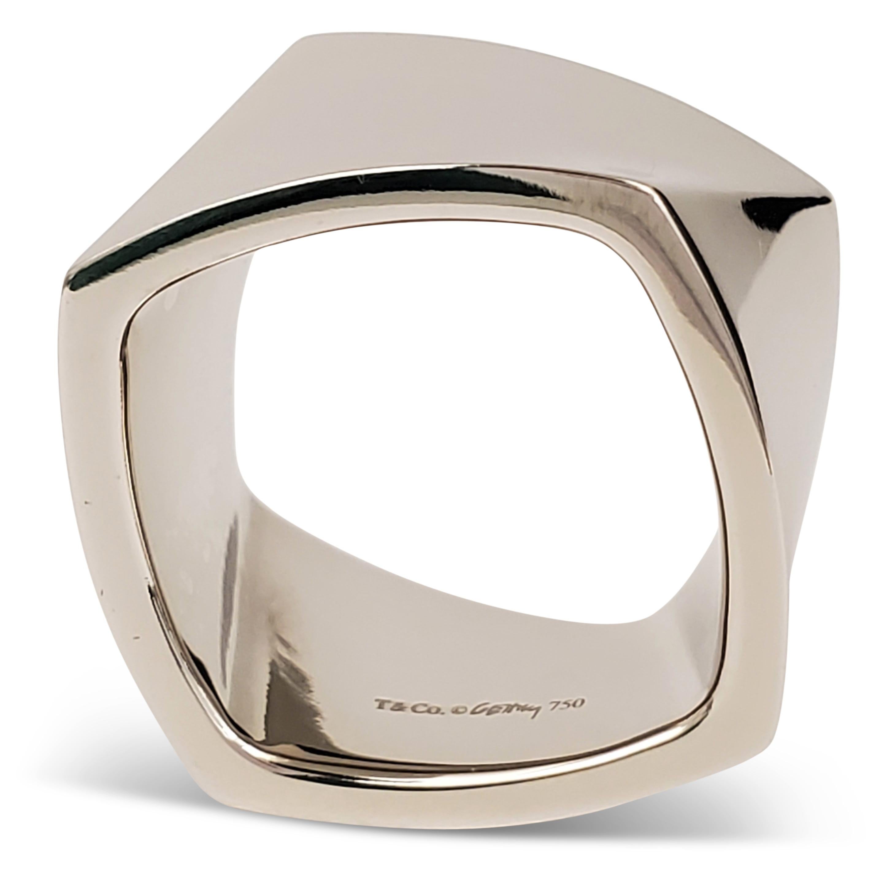 Authentic Tiffany & Co. ring designed by world-renowned architect, Frank Gehry.  Crafted in 18 karat white gold. Signed T&Co, Gehry, 750.  Size 6 3/4. CIRCA 2000s