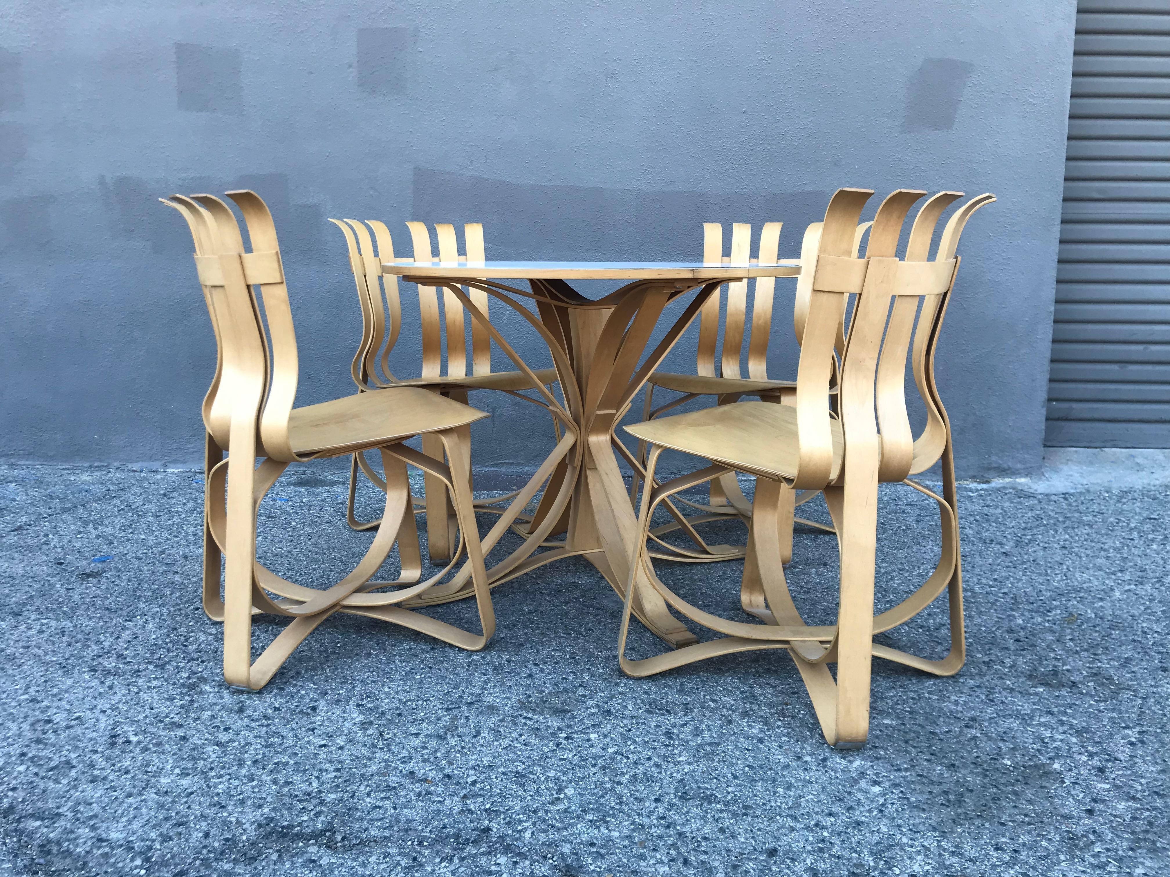 Nice bentwood design.
These are limited production pieces made to order.
Original condition showing minor wear with a nice patina consistent with age.
The table size is 29