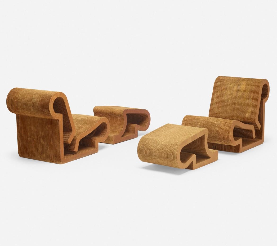 Frank Gehry pair of easy Edges chairs and ottomans. Easy Edges, Inc. Canada/USA, 1972. Laminated cardboard, masonite. Chair: 29¼ H × 23¼ W × 39 D in, ottoman: 14¾ H × 17¾ W × 30 D in (37
Applied paper manufacturer's label to underside of one ottoman