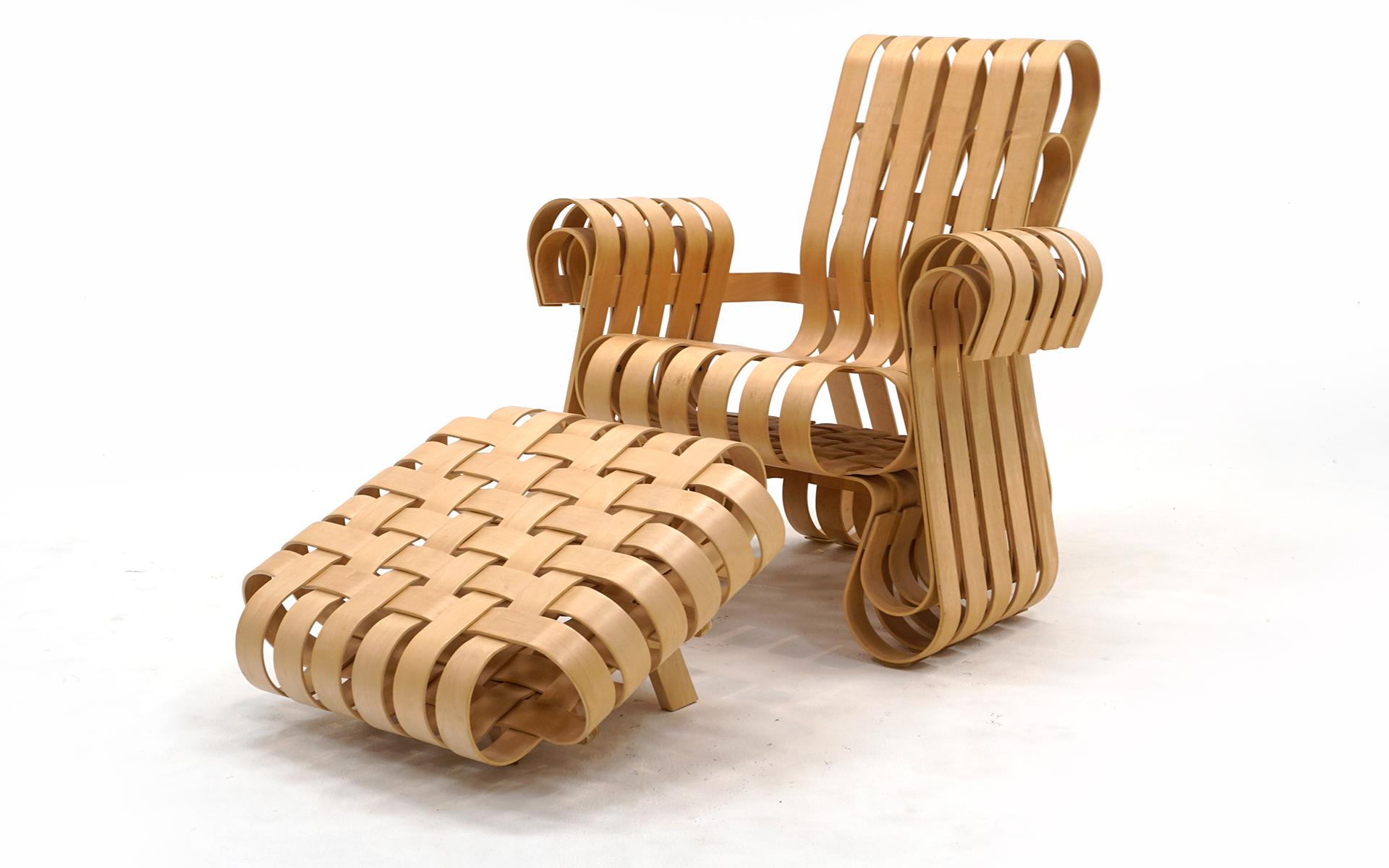 Power play chair and ottoman designed by Frank Gehry for Knoll in very close to new condition. There are no chips, cracks or repairs to the wood slats. Little if any signs of use. This set retails new for $14,000 plus shipping. This is a great