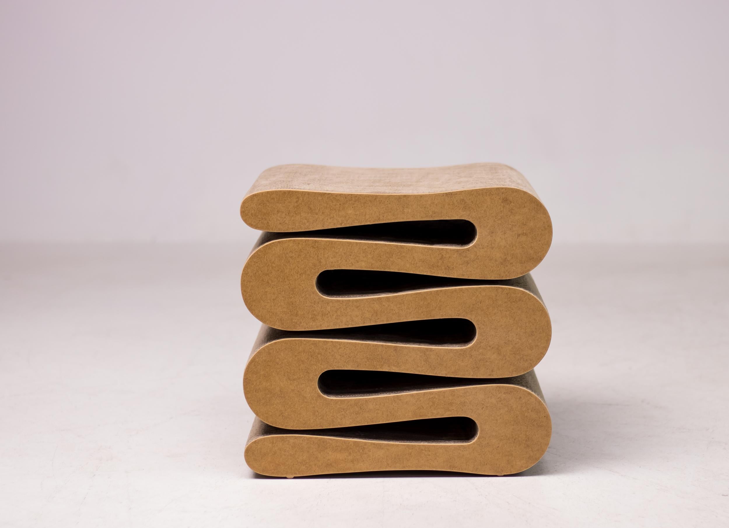 Frank Gehry Wiggle stool. Made of corrugated cardboard and hardboard to the edges.
Labeled underneath, excellent condition.

Frank Gehry is considered one of the most influential architects of the late 20th century. During the early period of his