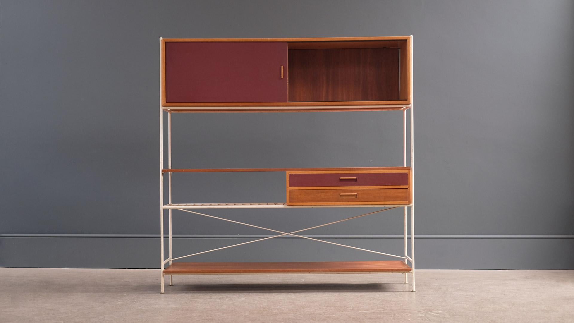 A beautiful and rare model 611 room divider in all original paint with wonderful patina designed in 1955 by Frank Guille for Kandya, UK. Exceptional example of this elegant ‘double sided’ design.