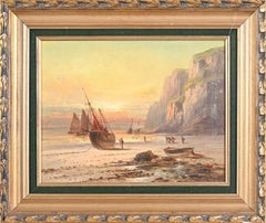 Antiguo óleo inglés Pescadores en la costa rocosa al atardecer