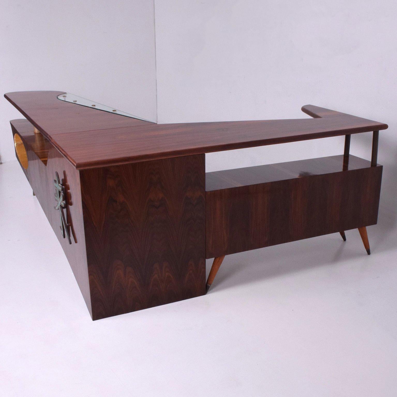 For your consideration a Mid-Century desk or bar in rosewood and parchment with bronze applications, designed by Frank Kyle. Hardware made by the foundry of Pepe Mendoza, with foundry marks.  
The desk is custom made. Mexico Circa 1950s. 
Beautiful