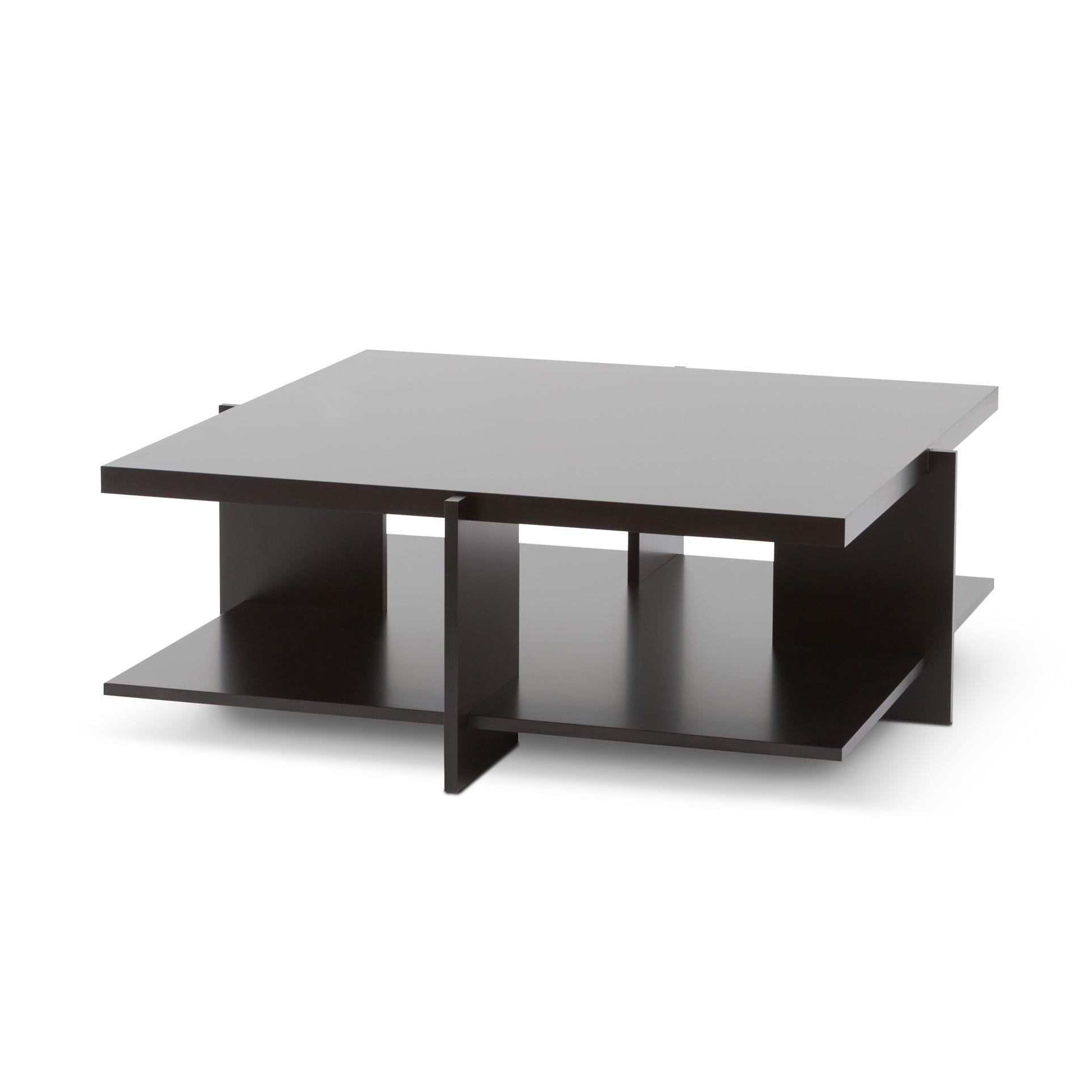 Coffee table designed by Frank Lloyd Wrigh circa 1939/56, relaunched in 1996.
Manufactured by Cassina in Italy.

These low square tables consist of six pieces: two horizontals at top
and bottom, into which are slotted four verticals, in the interior
