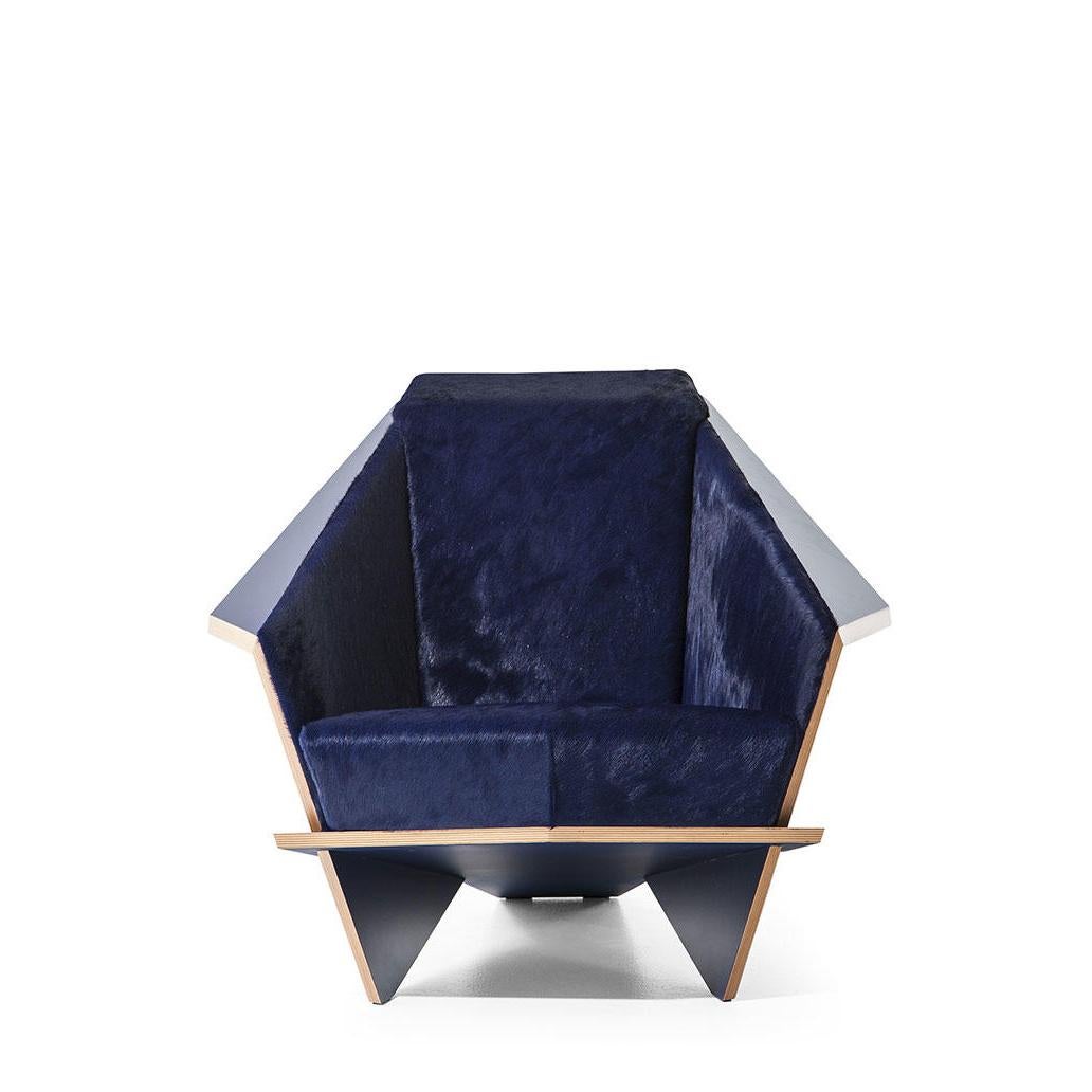 Armchair designed by Frank Lloyd Wrigh circa 1949 , relaunched in 1986-90.
Manufactured by Cassina in Italy.

Origami in wood, emblematic of Frank Lloyd Wright’s design maturity and ever-surprising aesthetic code, this armchair was created in