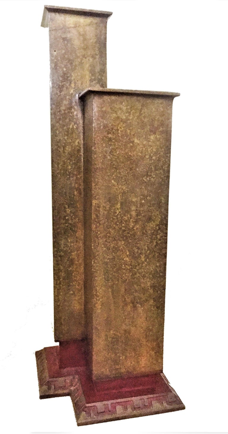 Frank Lloyd Wright Foundation Arts & Crafts Patinated Bronze Duo Vase, Limited Edition of 18, 1992

A monumental vase, consisting of two paired vases of the same square section but different heights. The red-accented narrow base gives the entire