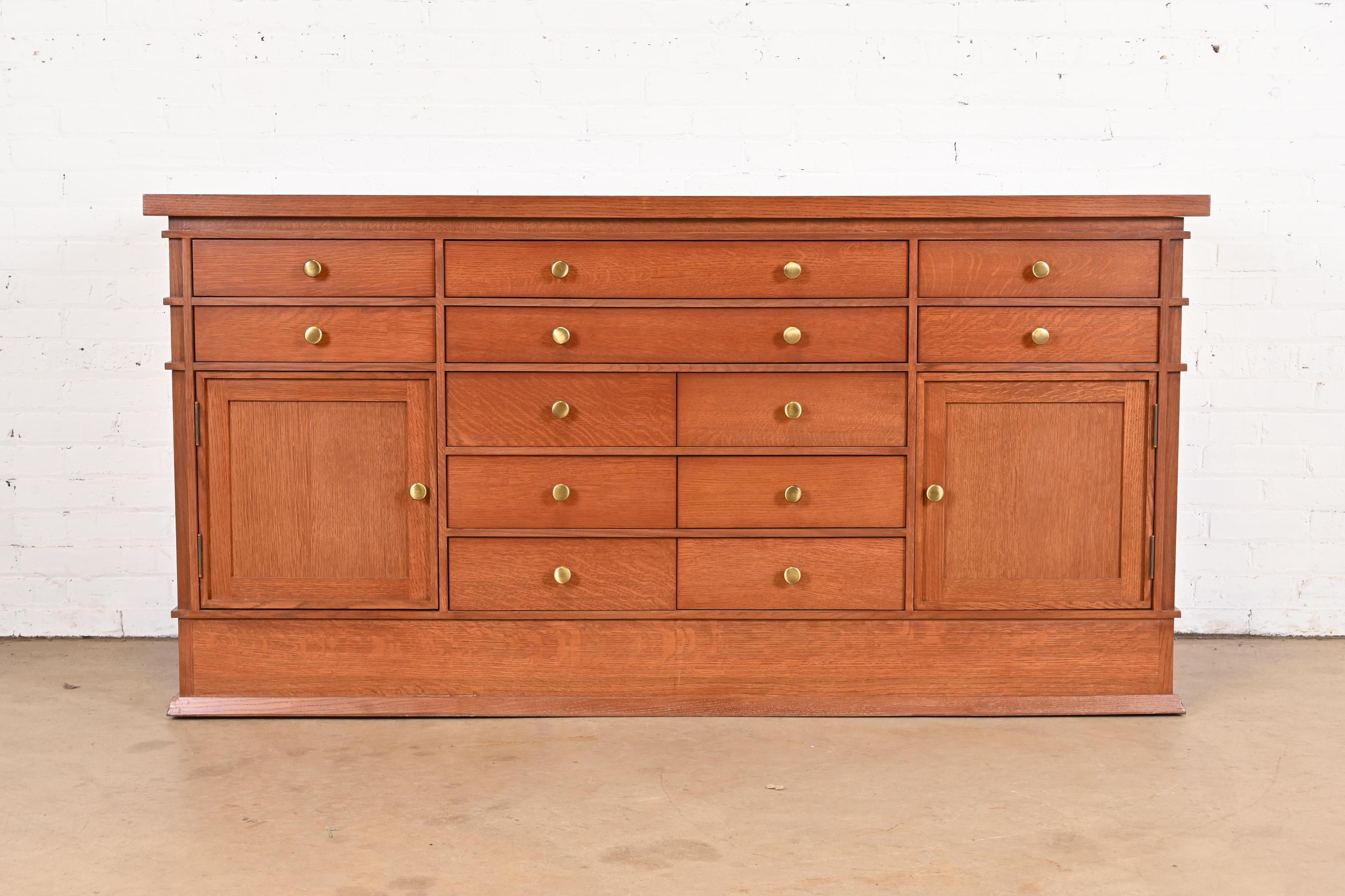 An exceptional Arts & Crafts style sideboard, credenza, or bar cabinet

Originally designed by Frank Lloyd Wright in 1903 for the dining room of Wright's George F. Barton House in Buffalo, New York. Reproduced by Heinz & Co. circa 1985.

Gorgeous