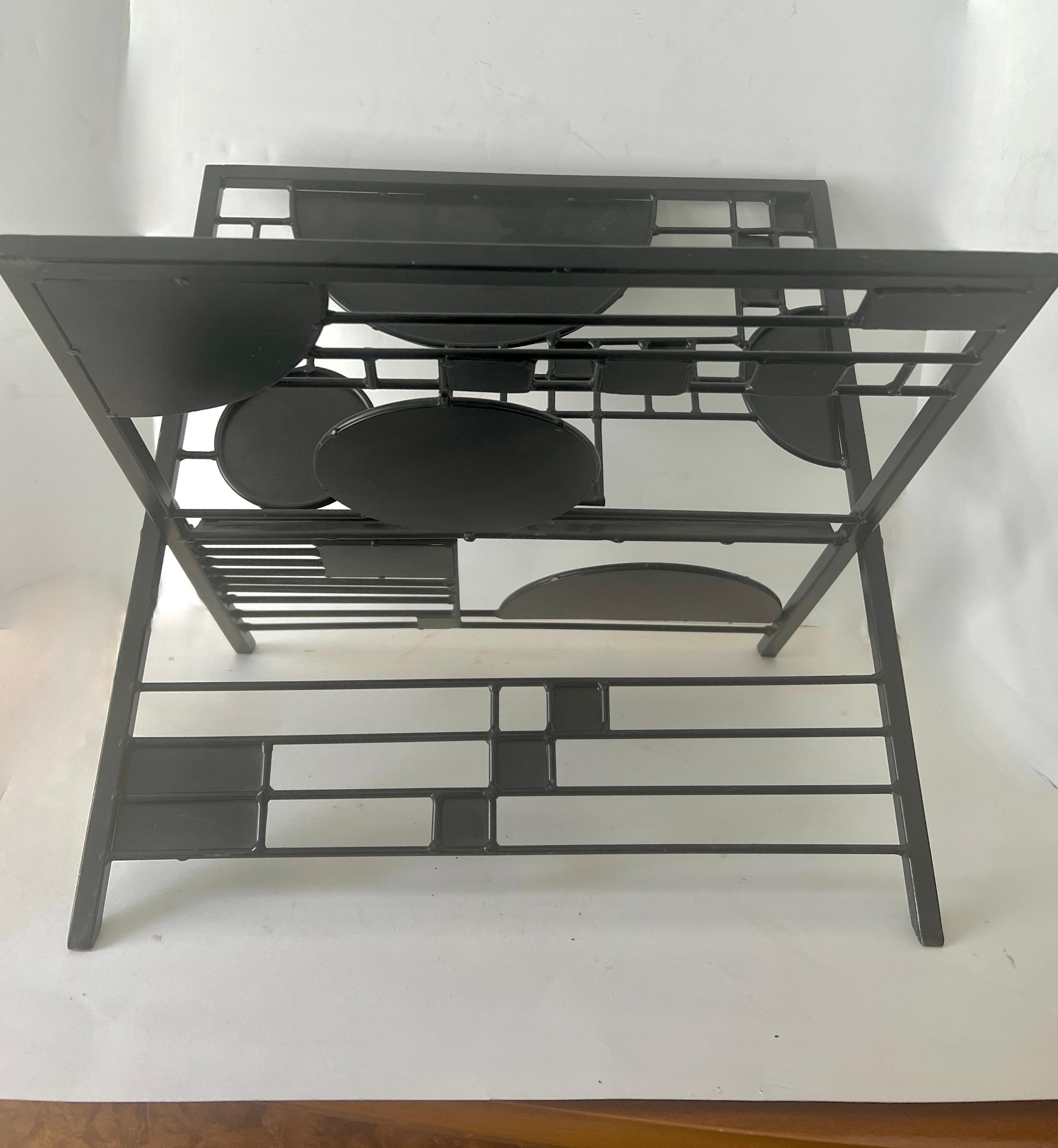 Frank Lloyd Wright Black Metal Graphic Magazine Rack In Good Condition For Sale In Los Angeles, CA