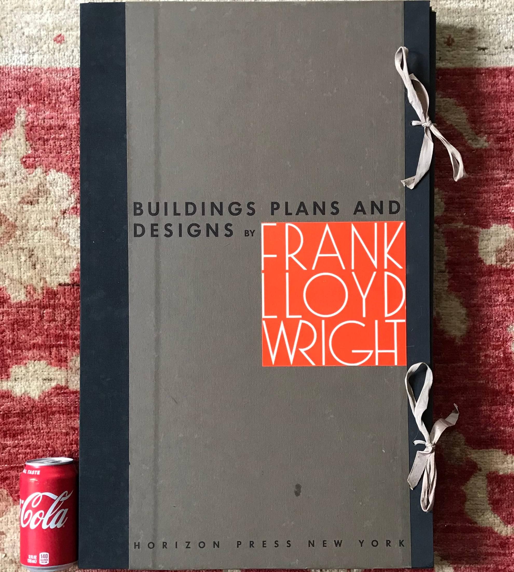 This is an enormous booklet (25.75 X 16 Inches): Frank Lloyd wright buildings, plans and designs.  100 Large scale plate drawings and plans on quality wove paper by Frank Lloyd Wright, all loose as issued in cloth and board portfolio. Including