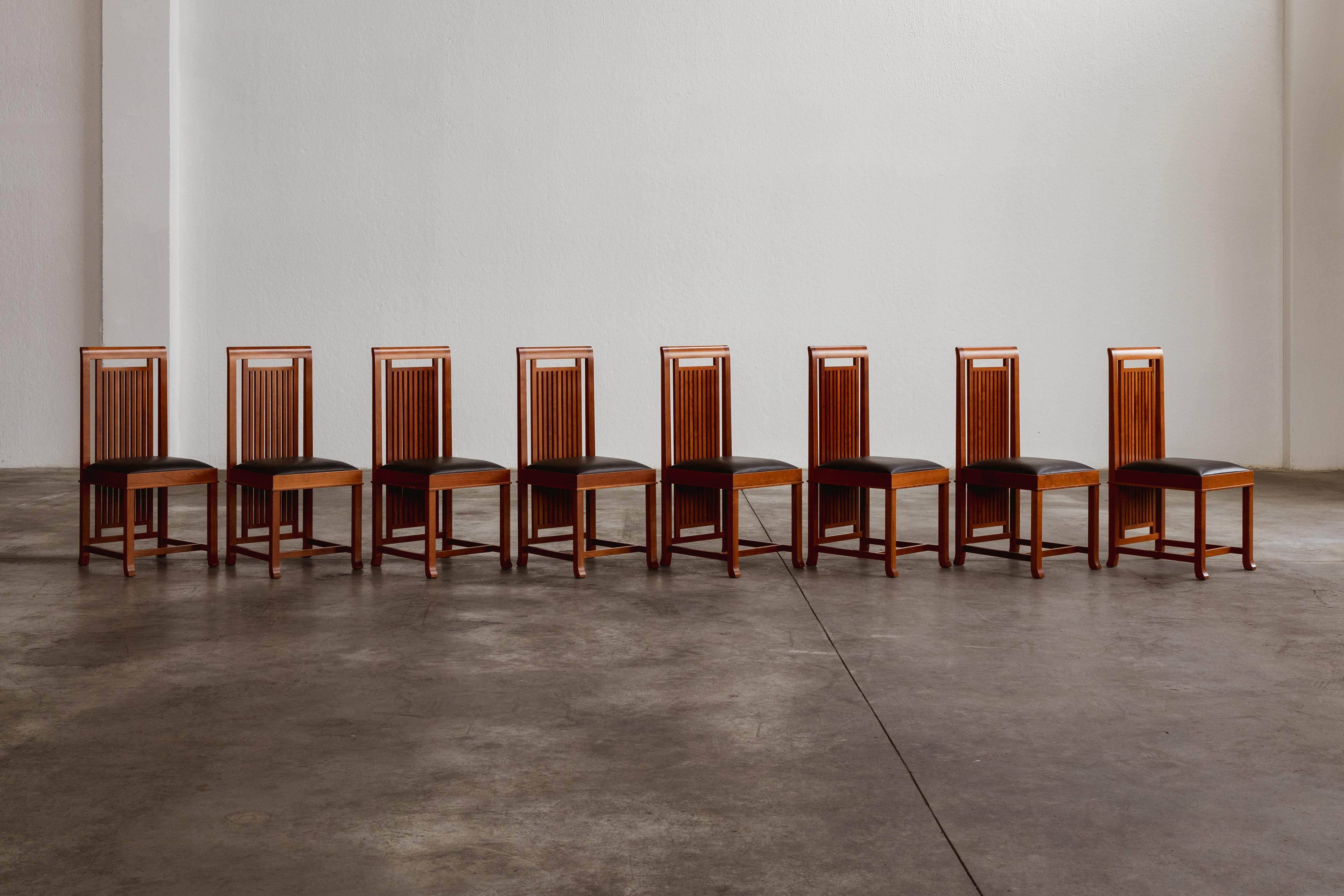 Frank Lloyd Wright “Coonley 2” dining chairs for Cassina, wood and leather, Italy, 1907, set of eight.

