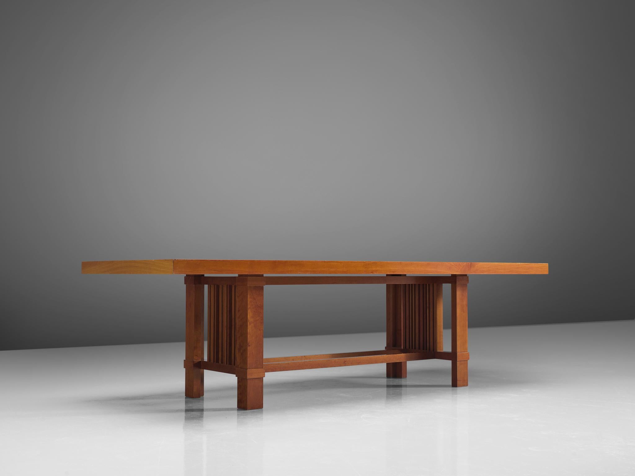 Frank Lloyd Wright for Cassina, '608 Taliesin' dining table, cherry, United States, design 1917, production 1989,

This 'Taliesin' table model 608 was designed by Frank Lloyd Wright in 1917 and produced by Cassina in 1989. The table has an