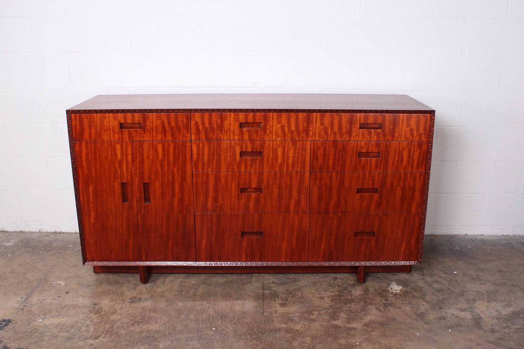 A mahogany chest of drawers designed by Frank Lloyd Wright for Henredon.