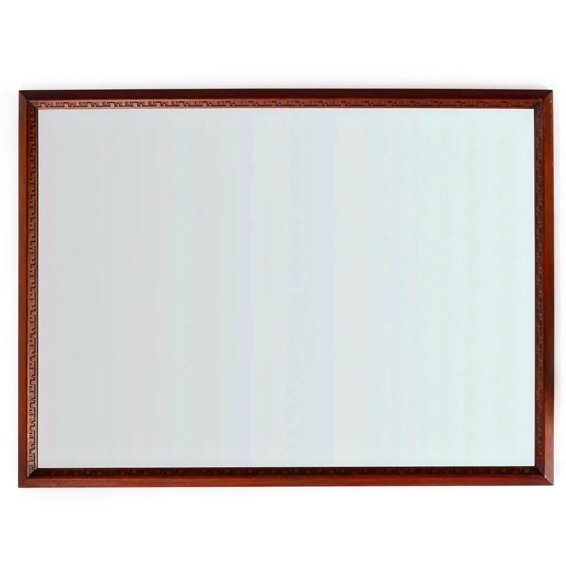 Frank Lloyd Wright for Heritage Henredon - Taliesin Group rectangular mirror circa 1955/56. Solid Mahogany. 
All original - looks to have been hardly, if ever used. Mahogany has been cleaned and conditioned. Mirrored glass is in excellent condition,