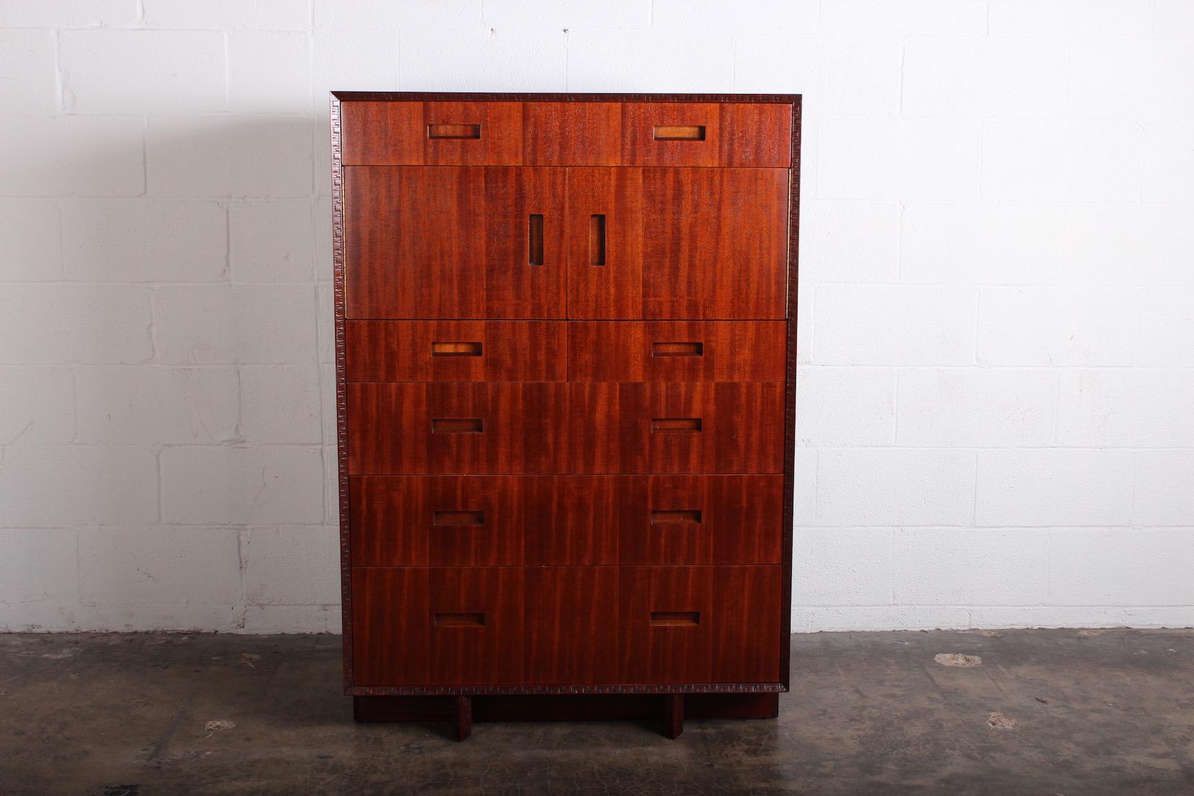 A mahogany cabinet designed by Frank Lloyd Wright for Henredon.