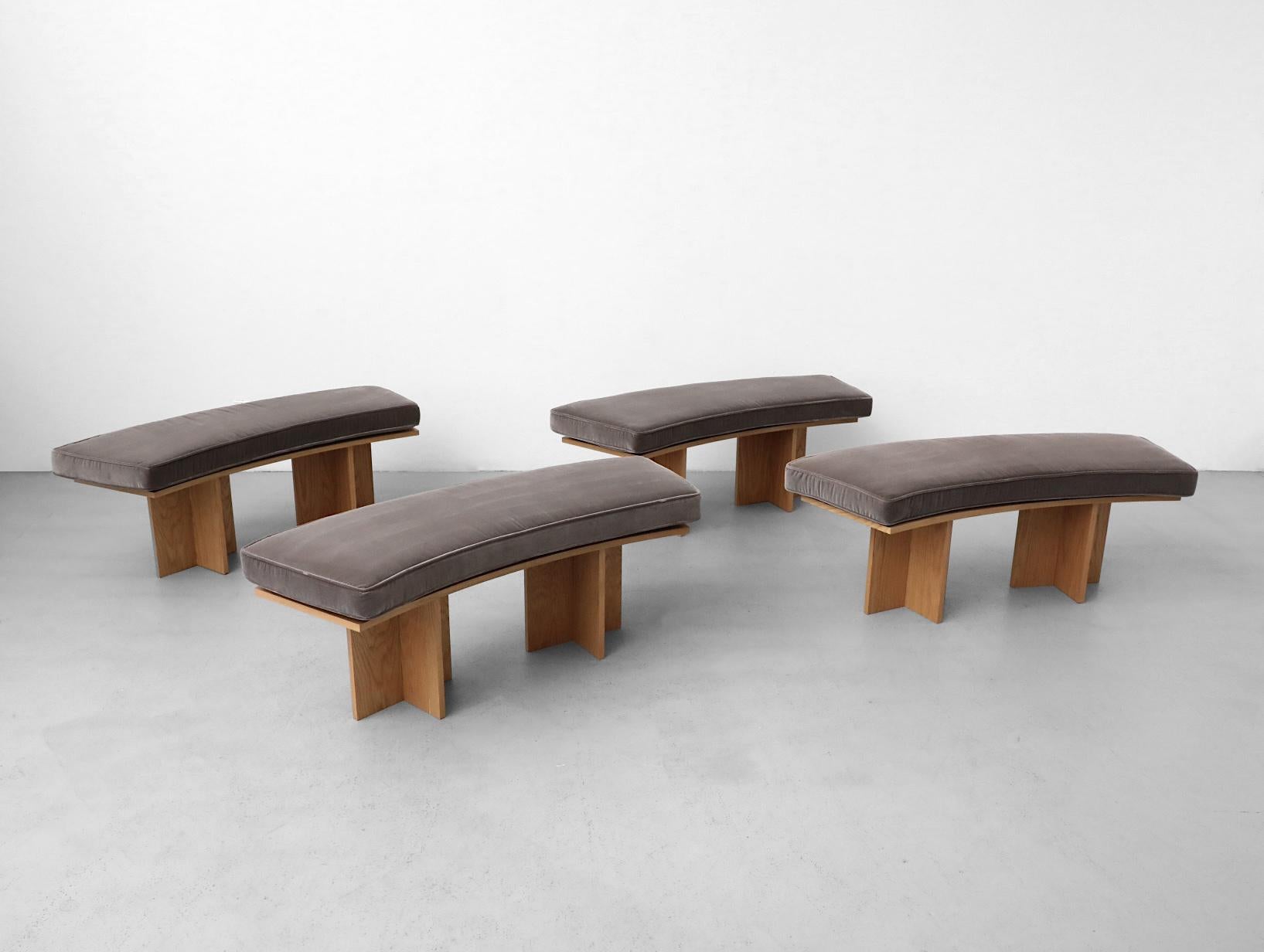 Beautiful Simon St. James Studio (Los Angeles) designed curved oak benches with gray velvet cushions inspired by Frank Lloyd Wright. Stylish benches with attractive grain and plush comfortable seating. Individually listed with minimal wear perfect