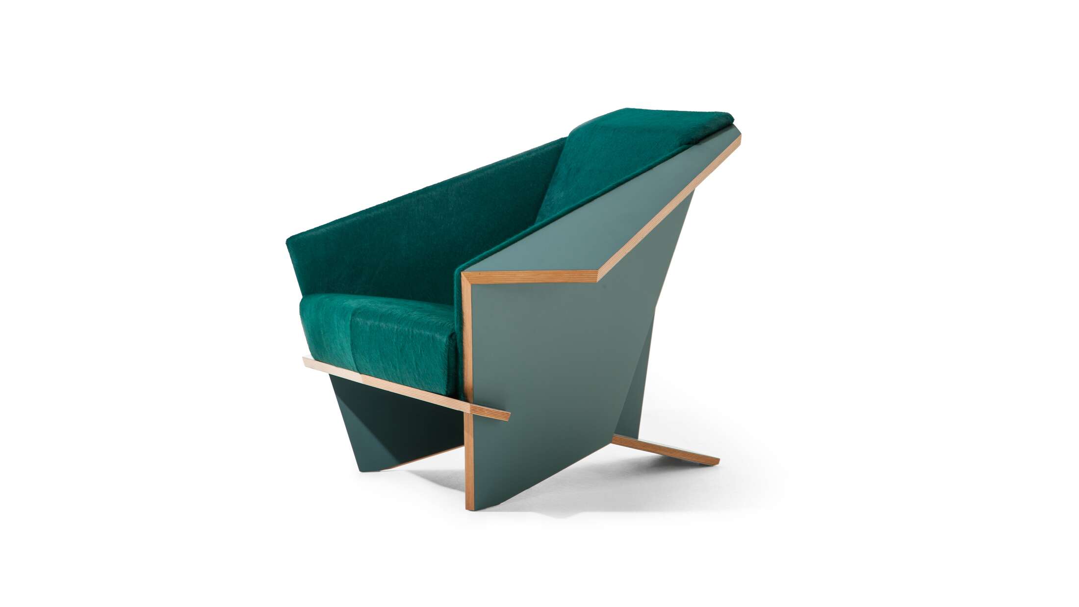 Limited edition armchair designed by Frank Lloyd Wright circa 1949. Hairy skin and lacquered oak edition. Manufactured by Cassina in Italy. Prices vary dependent on the chosen color. 

Origami in wood, emblematic of Frank Lloyd Wright’s design