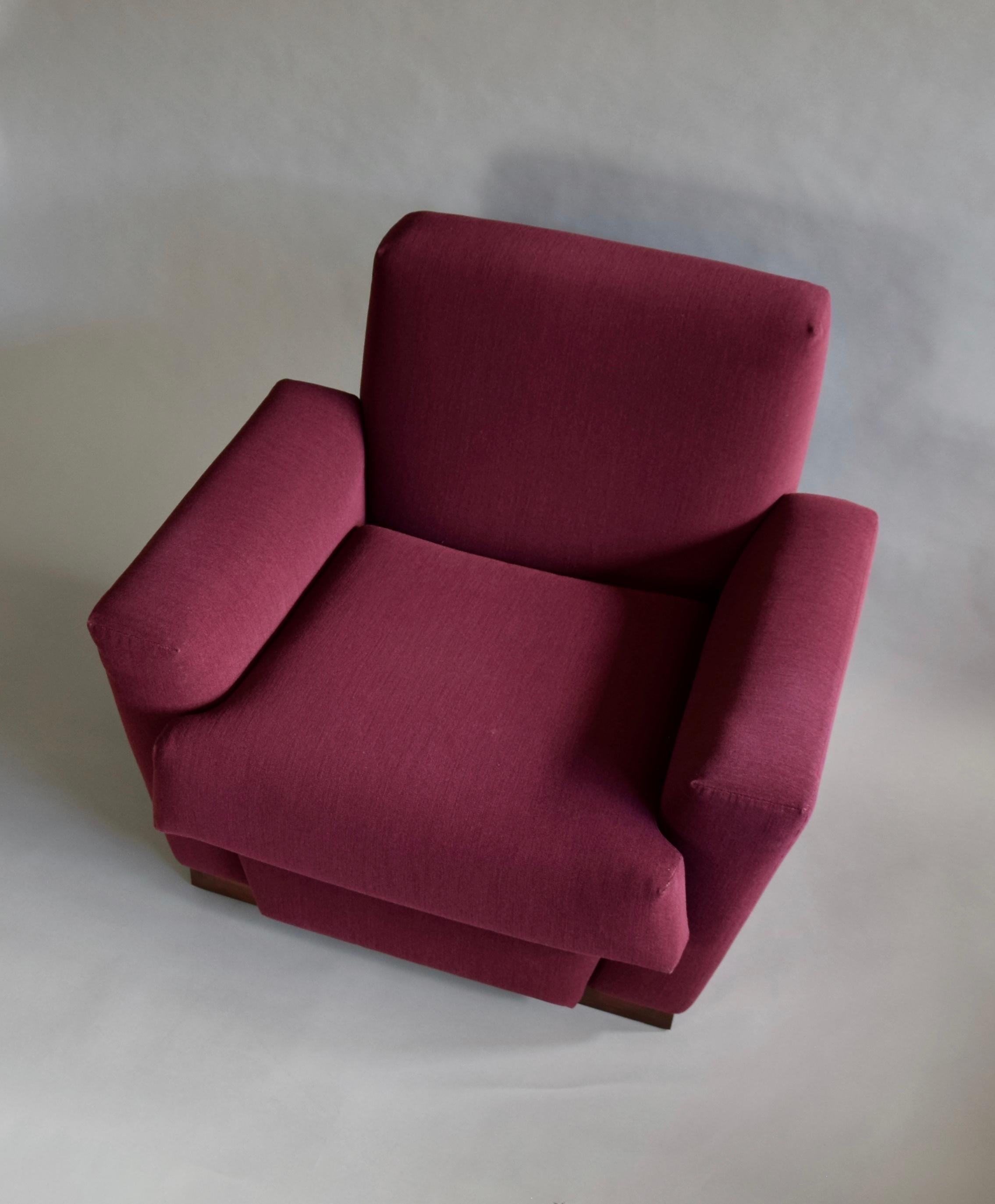 Limited edition lounge chair designed by Frank Lloyd Wright in the 1920's for the Tokyo Imperial Hotel. 

A select number of Wright furniture designs from the Imperial Hotel were put into limited production in 1996 by Cassina (owner of FLW