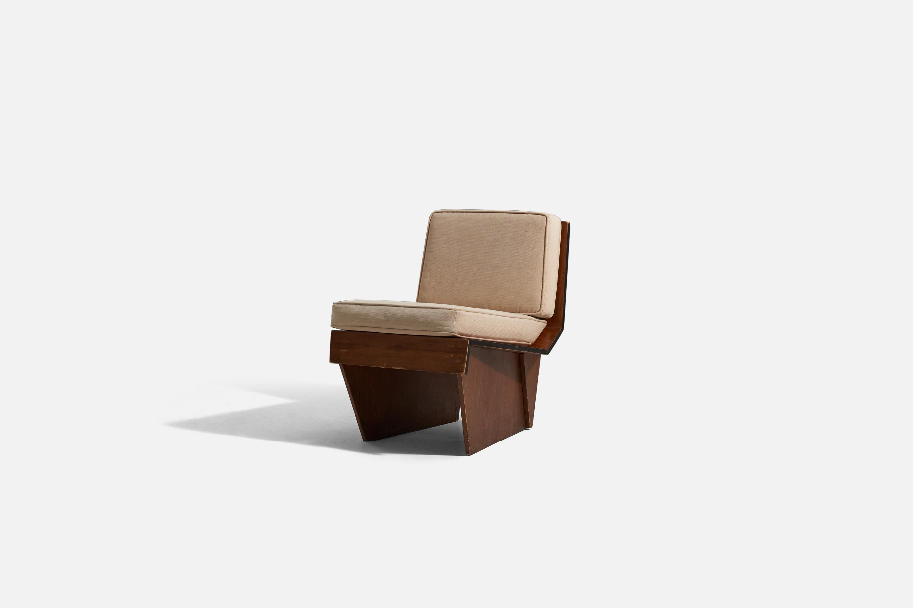 A wood and fabric lounge chair designed by Frank Lloyd Wright, produced by his Taliesin studio, United States, 1938.

Frank Lloyd Wright chair for the Charles L. and Dorothy Manson House, Wausau, Wisconsin, 1938

The Manson House is documented