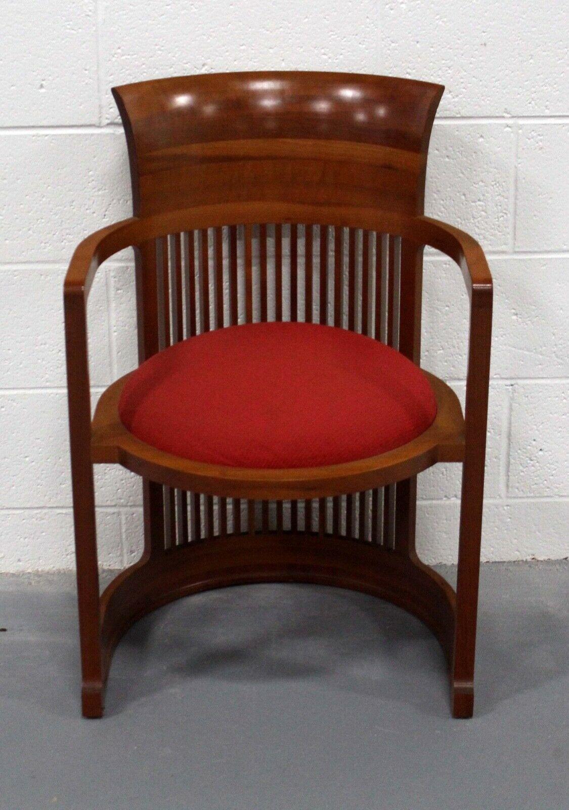 From Le Shoppe Too in Michigan comes this iconic Frank Lloyd Wright Arts & Crafts or Prairie style barrel chair. In the traditional Mission style, this accent chair also known as the 'Taliesin' is made of cherry wood with a comfortable, upholstered