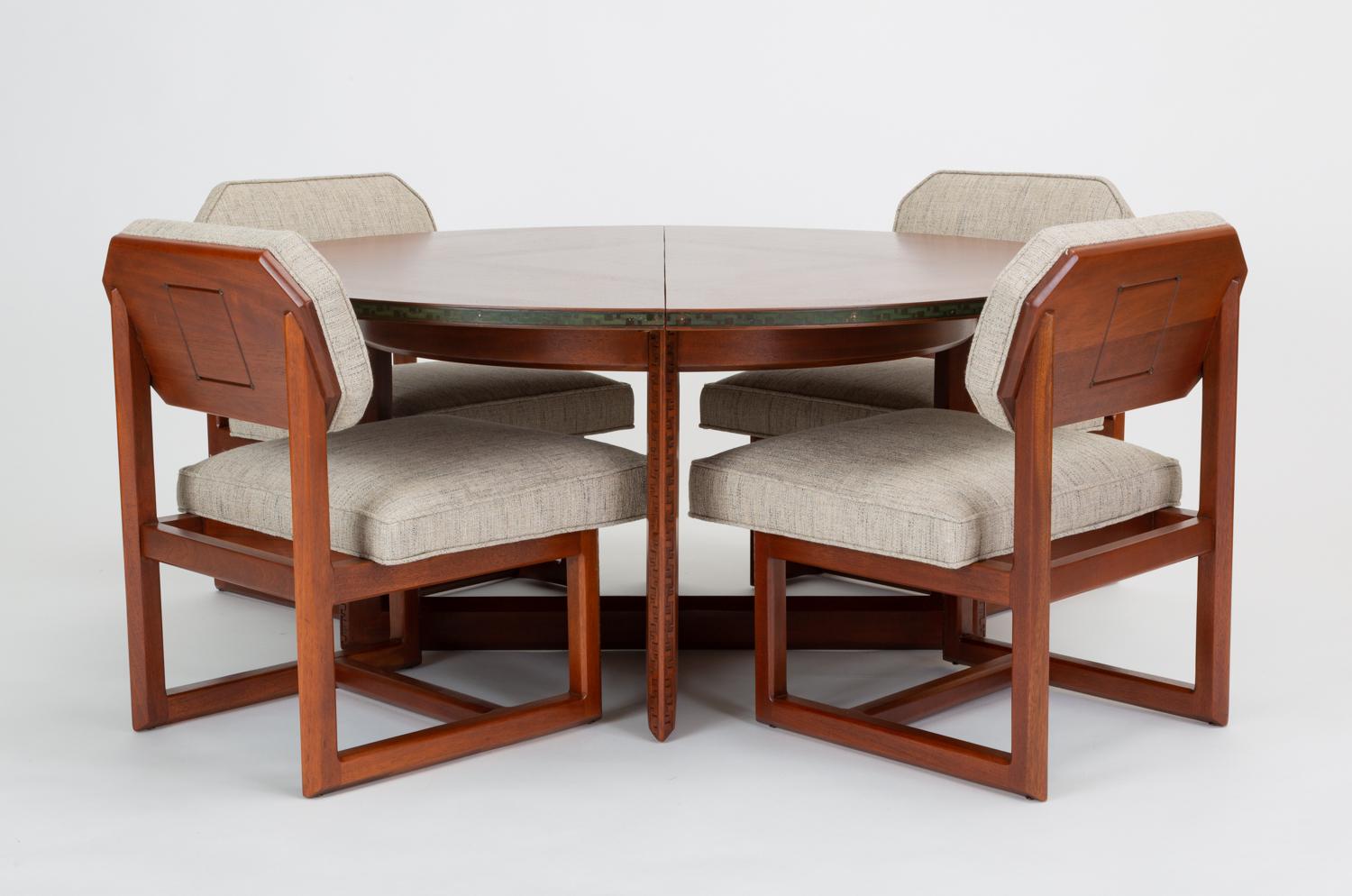 A low game table with four matching chairs designed in 1955 by Frank Lloyd Wright for Heritage Henredon. The line, dubbed “Taliesin” after Wright’s Wisconsin estate, combined essential geometric forms - circle, triangle, hexagon - to create an