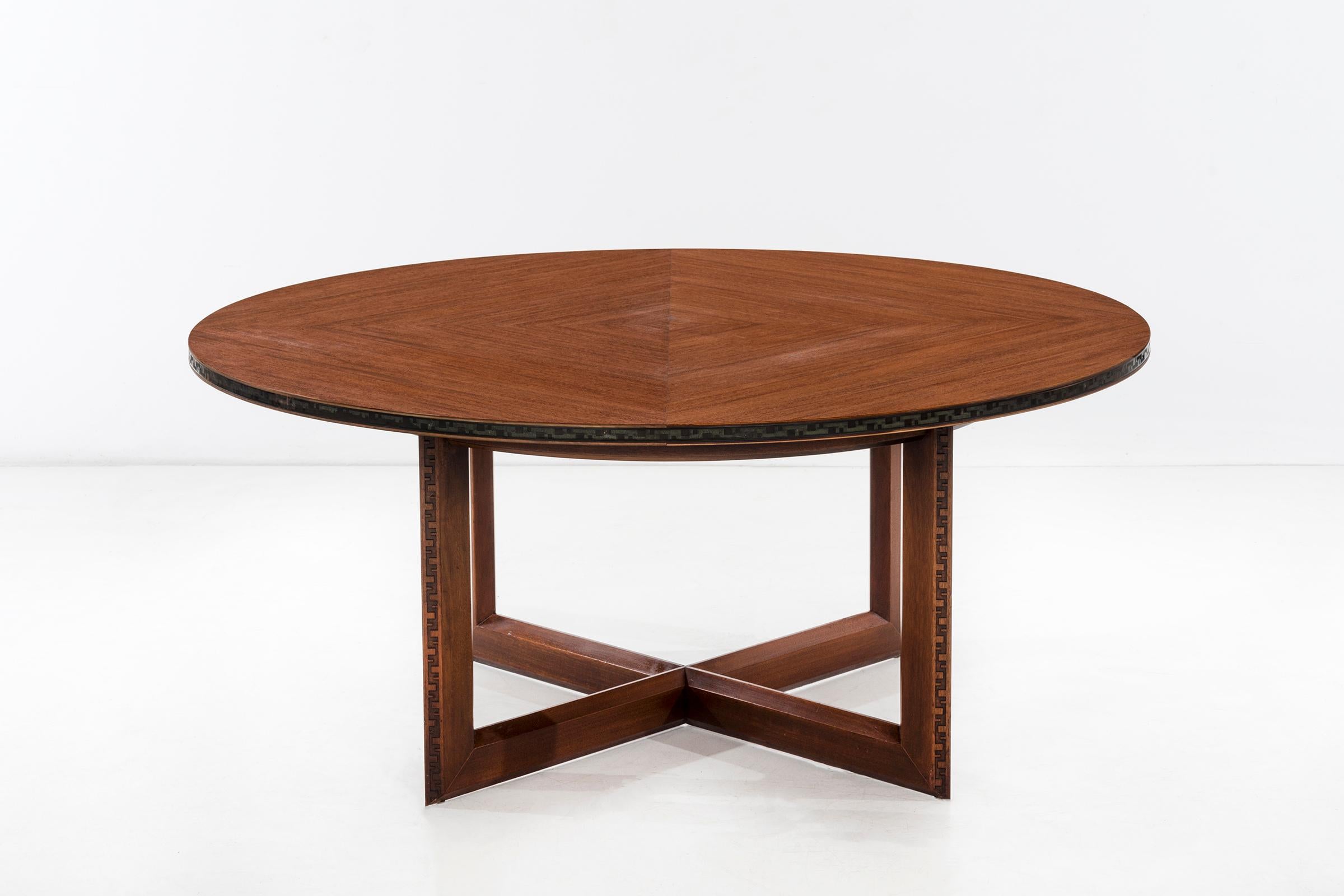 Frank Lloyd Wright for Heritage Henredon. Taliesin dining or game table. Mahogany table, concentric square pattern bookmatched with embossed copper 