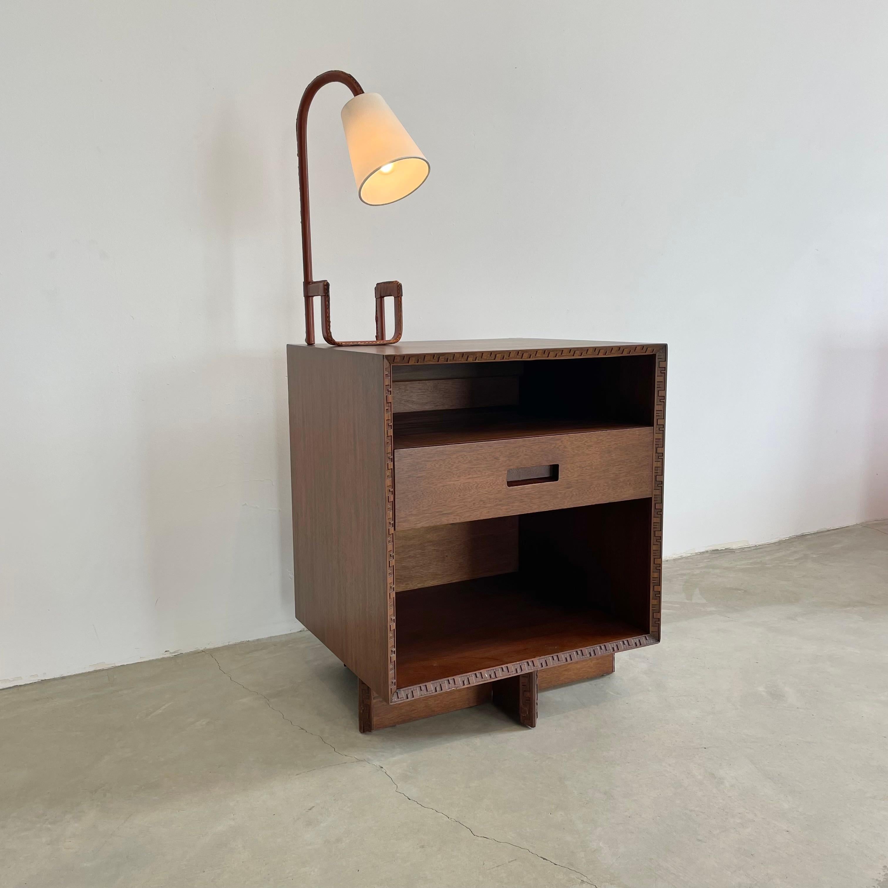 A rare and exceptional refinished Honduran Mahogany 'Taliesin' platform nightstand (or side table / end table) was designed by Frank Lloyd Wright for Heritage-Henredon in 1955 and produced only for two years, therefore is now a highly sought-after