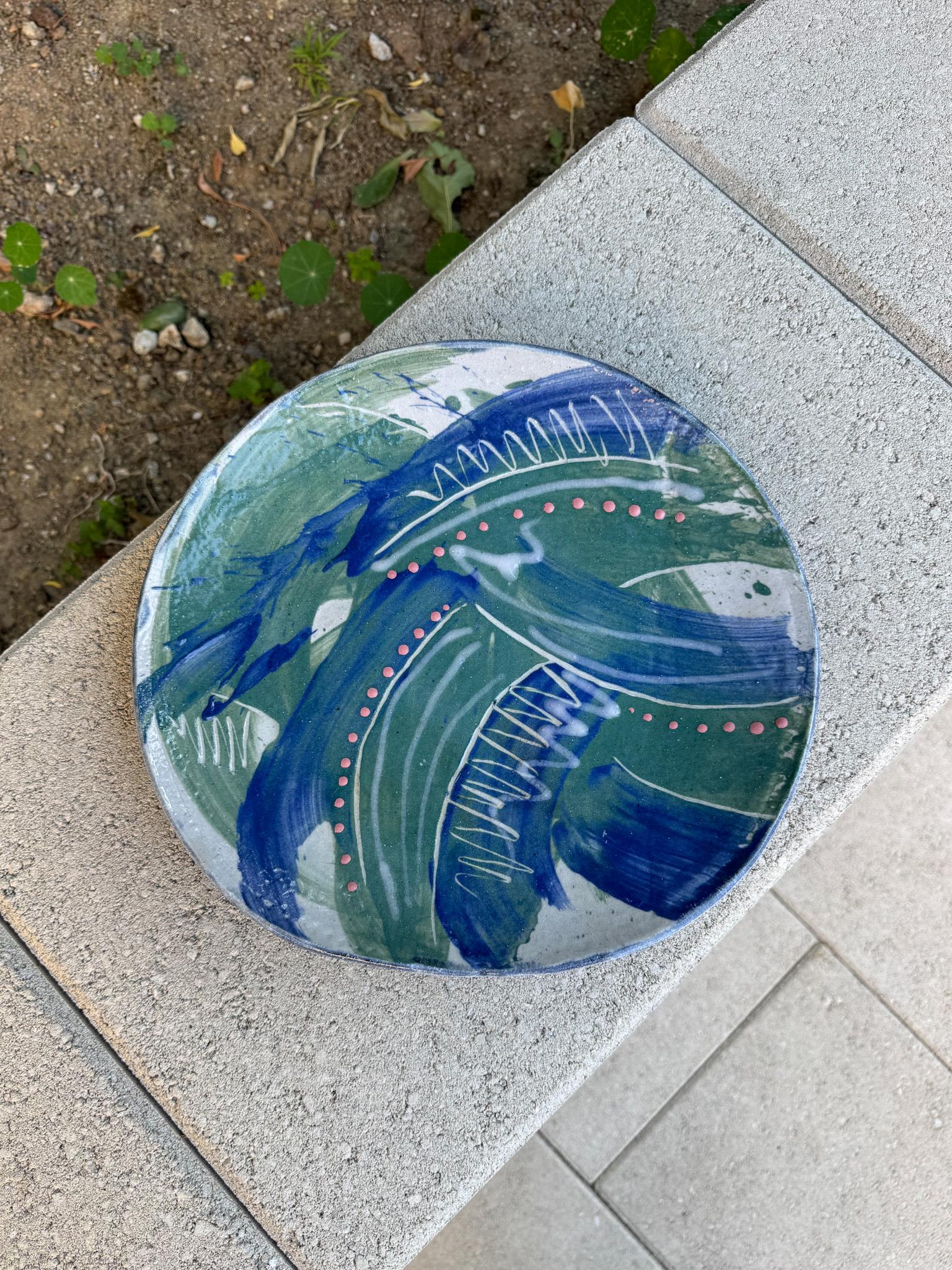 Frank Matranga Signed Ceramic Charger, California, 20th Century.  Buyer can easily add a wire to the back to mount onto the wall.  
