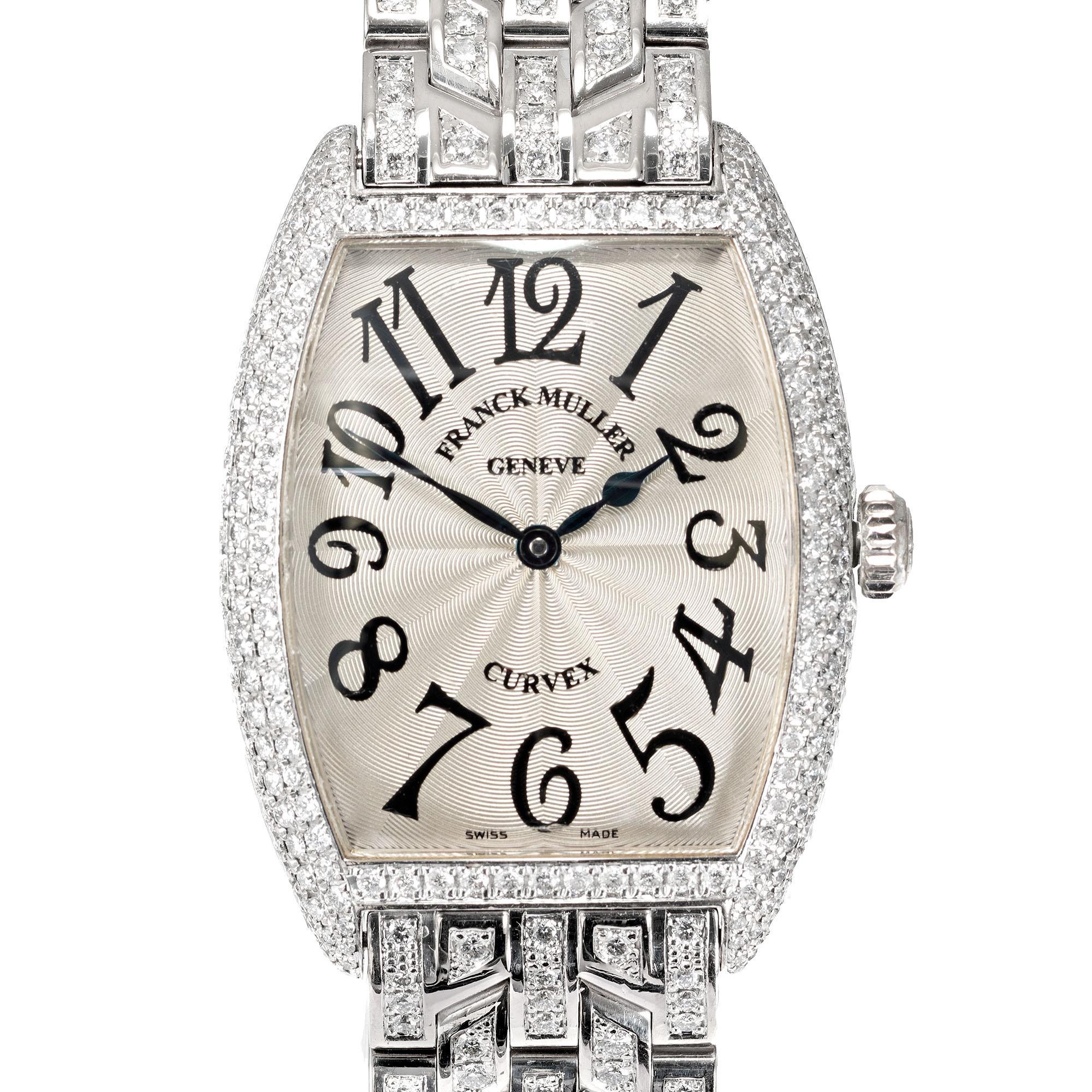 Frank Muller solid 18k white gold diamond curvex 7502 quartz wristwatch with 18k white gold diamond band. Full size band.

279 round brilliant cut diamonds VS G-H, approx. 3.00cts
141.6 grams
7.75 Inches long- easily shortened
Length: 39mm
Width: