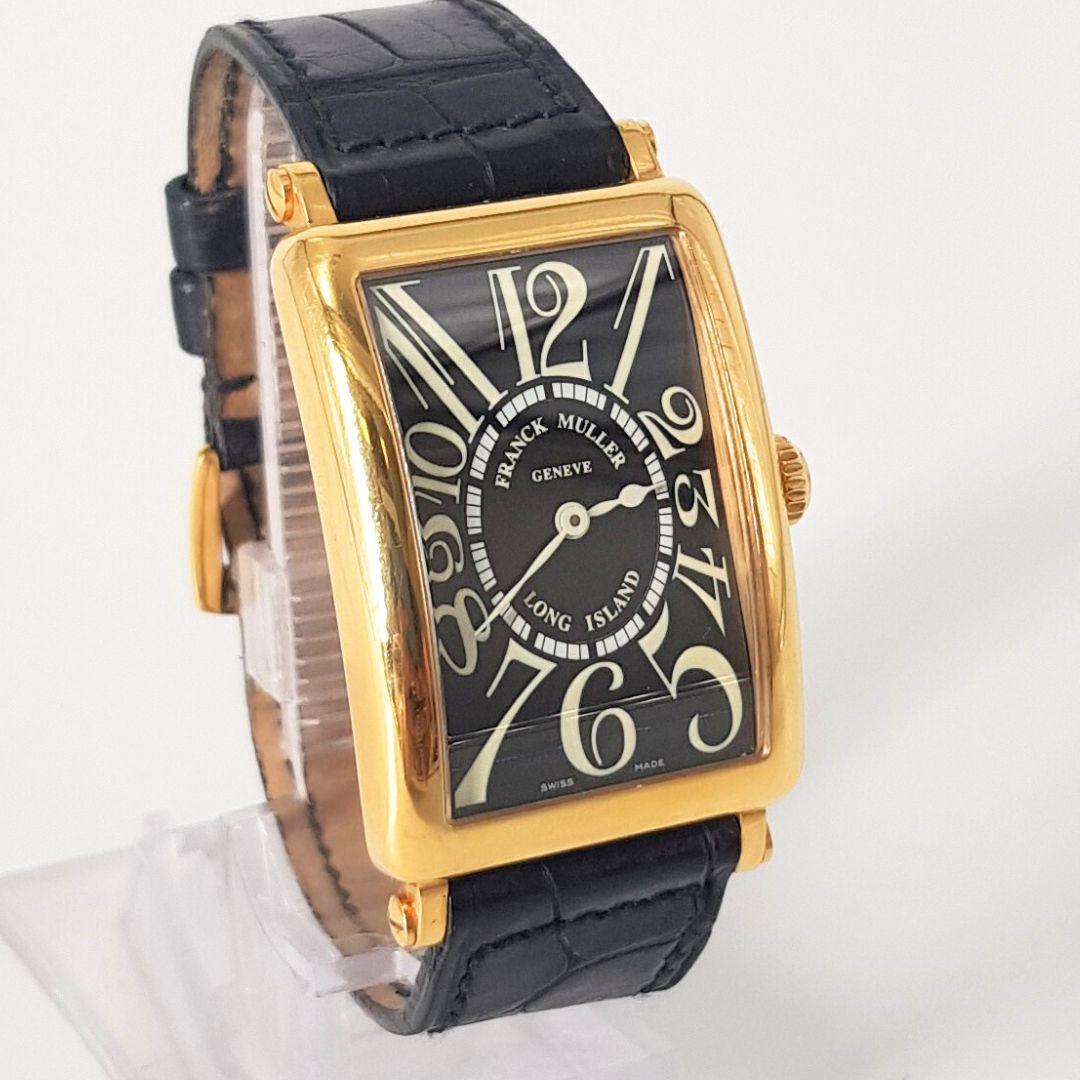 Exquisite
GENDER:  Unisex
MOVEMENT: Quartz
CASE MATERIAL: 18ct Yellow Gold 
DIAL: 
DIAL COLOUR: Black
STRAP: 36mm X 26mm
BRACELET MATERIAL: Leather 
CONDITION: 9/10 
MODEL NUMBER: No  303
SERIAL NUMBER: 9 950 QZ
YEAR: 2021
BOX – No
PAPERS – No
