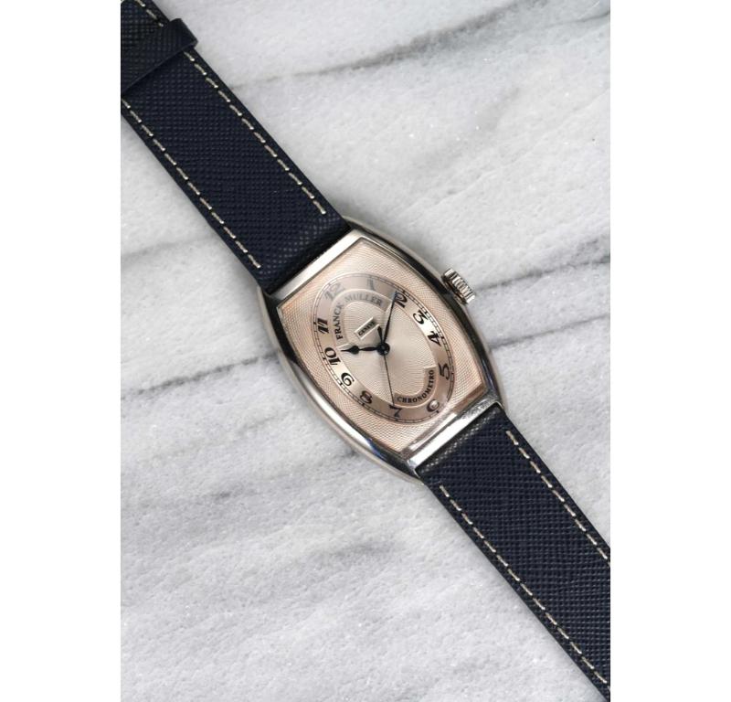 Here's a Neo-vintage Frank Muller automatic in 18k white gold with a silver guiolloche dial and arabic numerals from the 1990s. Keeps great time and is fully functional. Measurements include a 32x45mm case and 18mm lug width. On a aftermarket blue