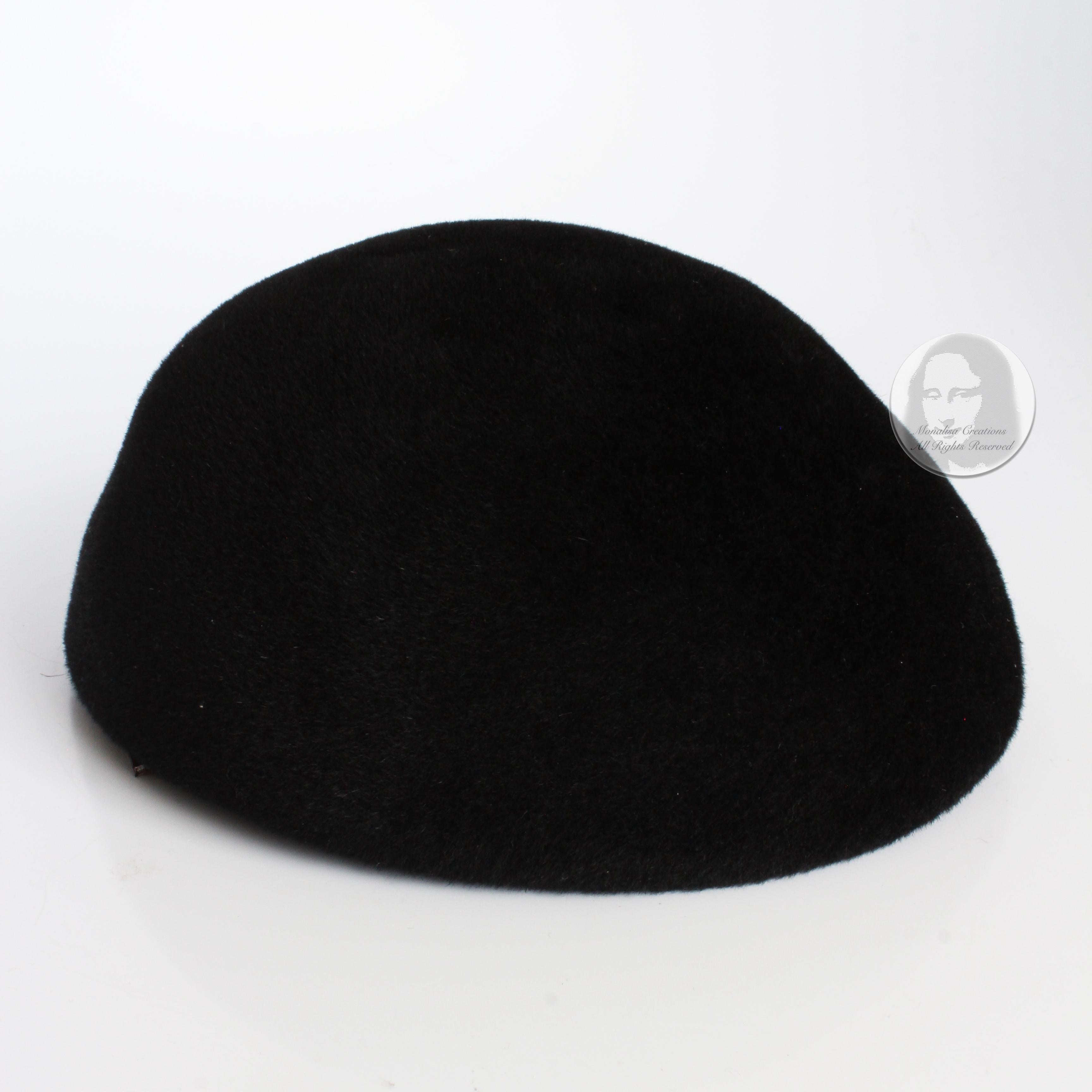 Frank Olive for I. Magnin Calot or Juliette hat, likely made in the late 60s.  Made from an incredibly soft black velour, it features tiny hair combs at each side to secure for wear.  

So easy to wear and elevate your style! A classic accessory