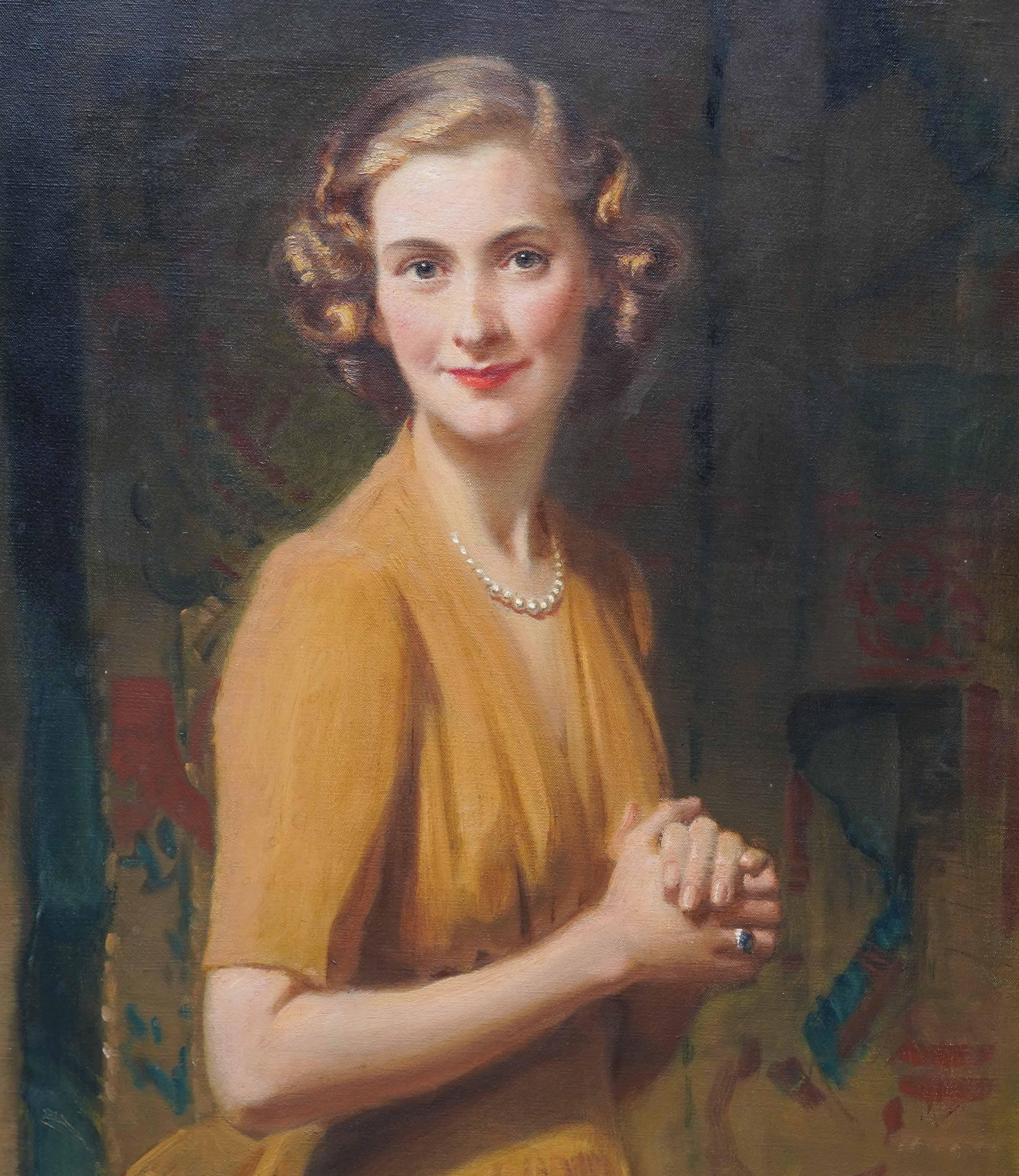 Portrait of a Lady in Gold Dress - British 1940's female portrait oil painting - Art Deco Painting by Frank O'Salisbury