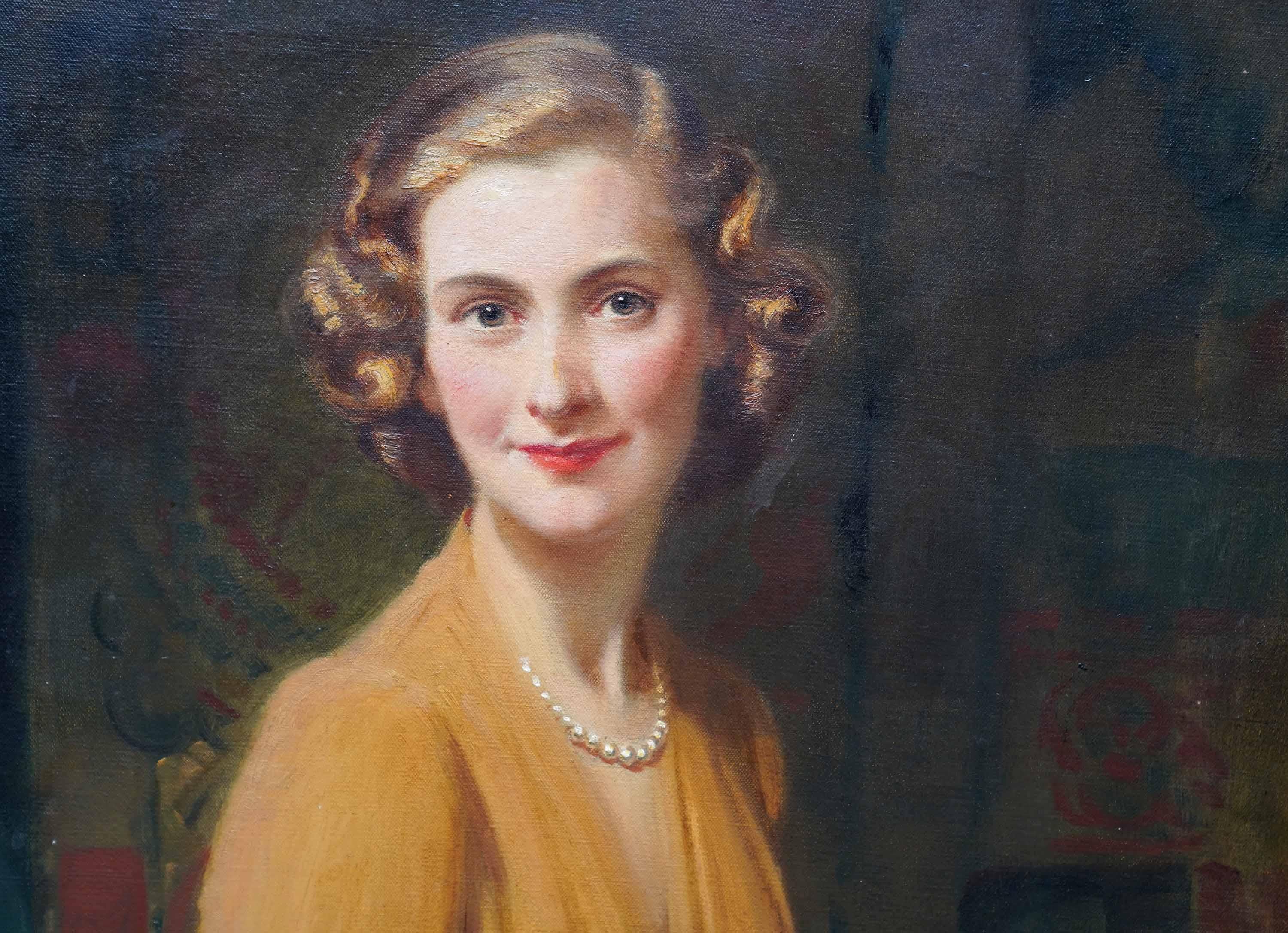 Portrait of a Lady in Gold Dress - British 1940's female portrait oil painting - Black Portrait Painting by Frank O'Salisbury